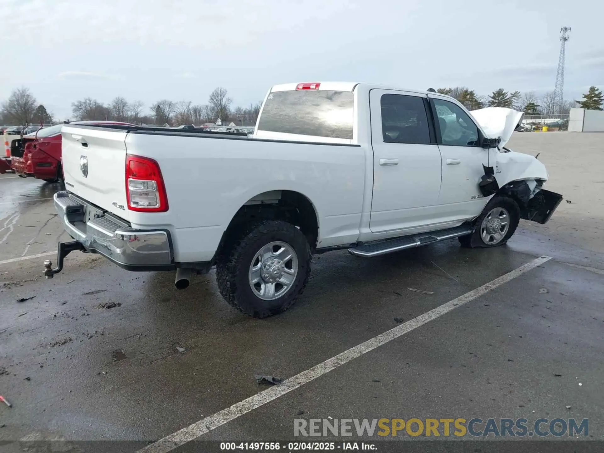4 Photograph of a damaged car 3C6UR5DL0NG103812 RAM 2500 2022
