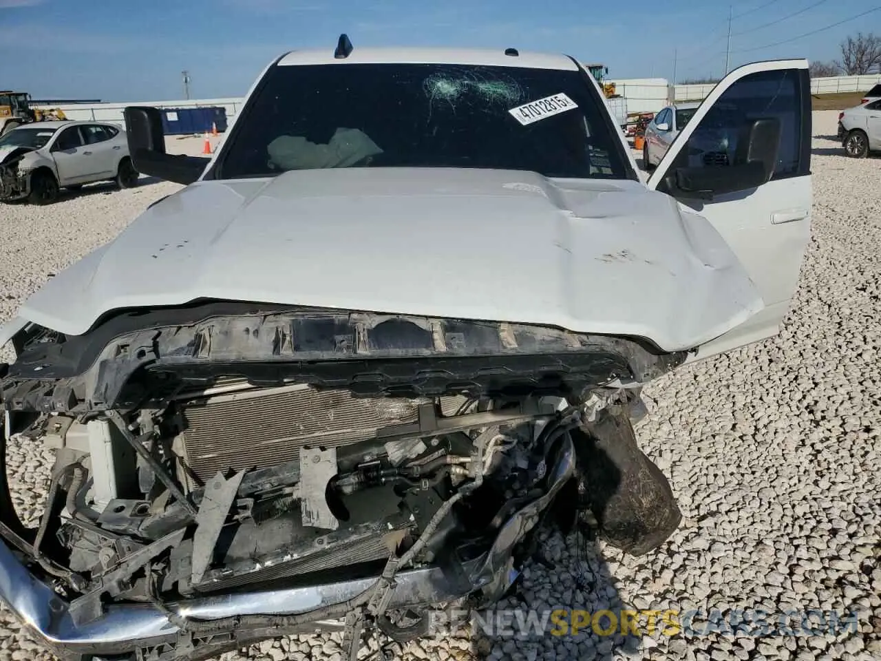 13 Photograph of a damaged car 3C6UR5DL0NG298052 RAM 2500 2022