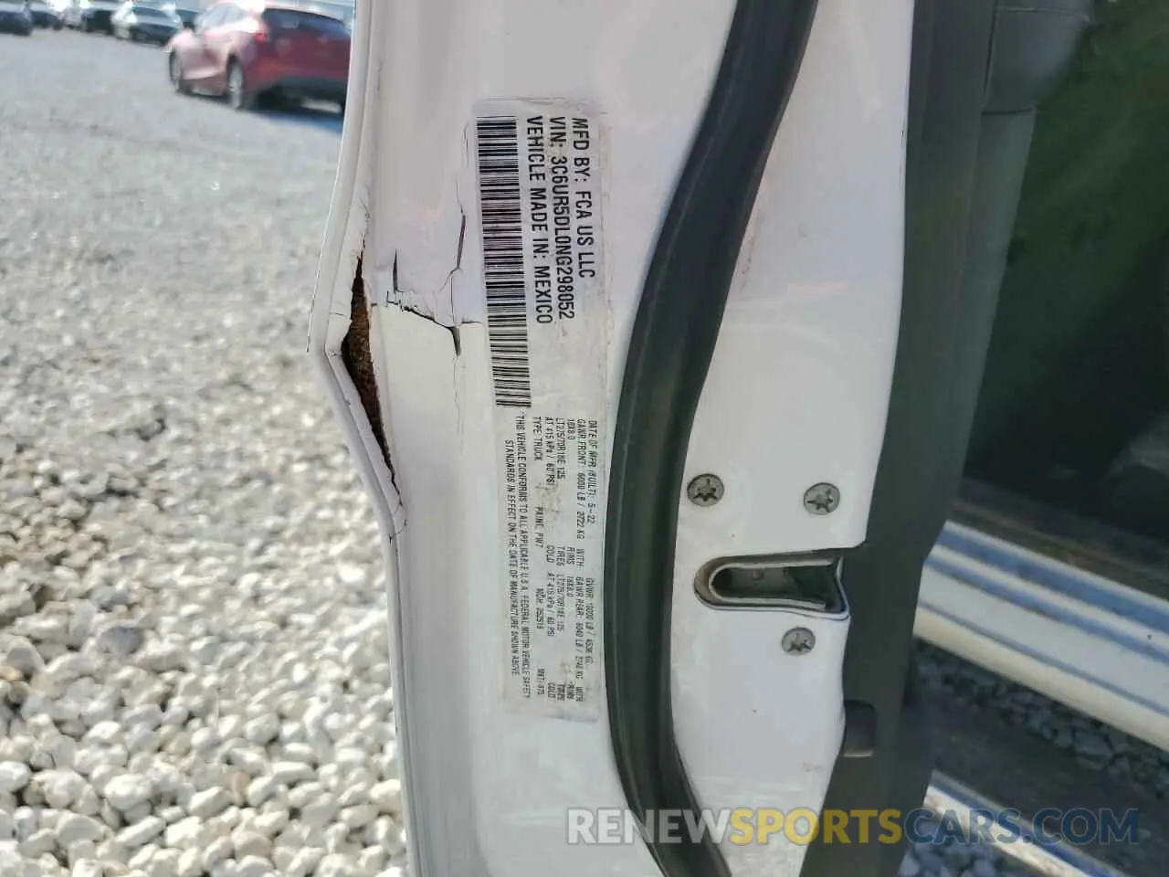 14 Photograph of a damaged car 3C6UR5DL0NG298052 RAM 2500 2022