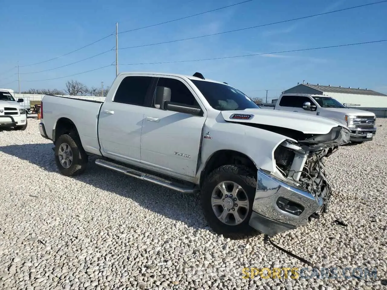 4 Photograph of a damaged car 3C6UR5DL0NG298052 RAM 2500 2022
