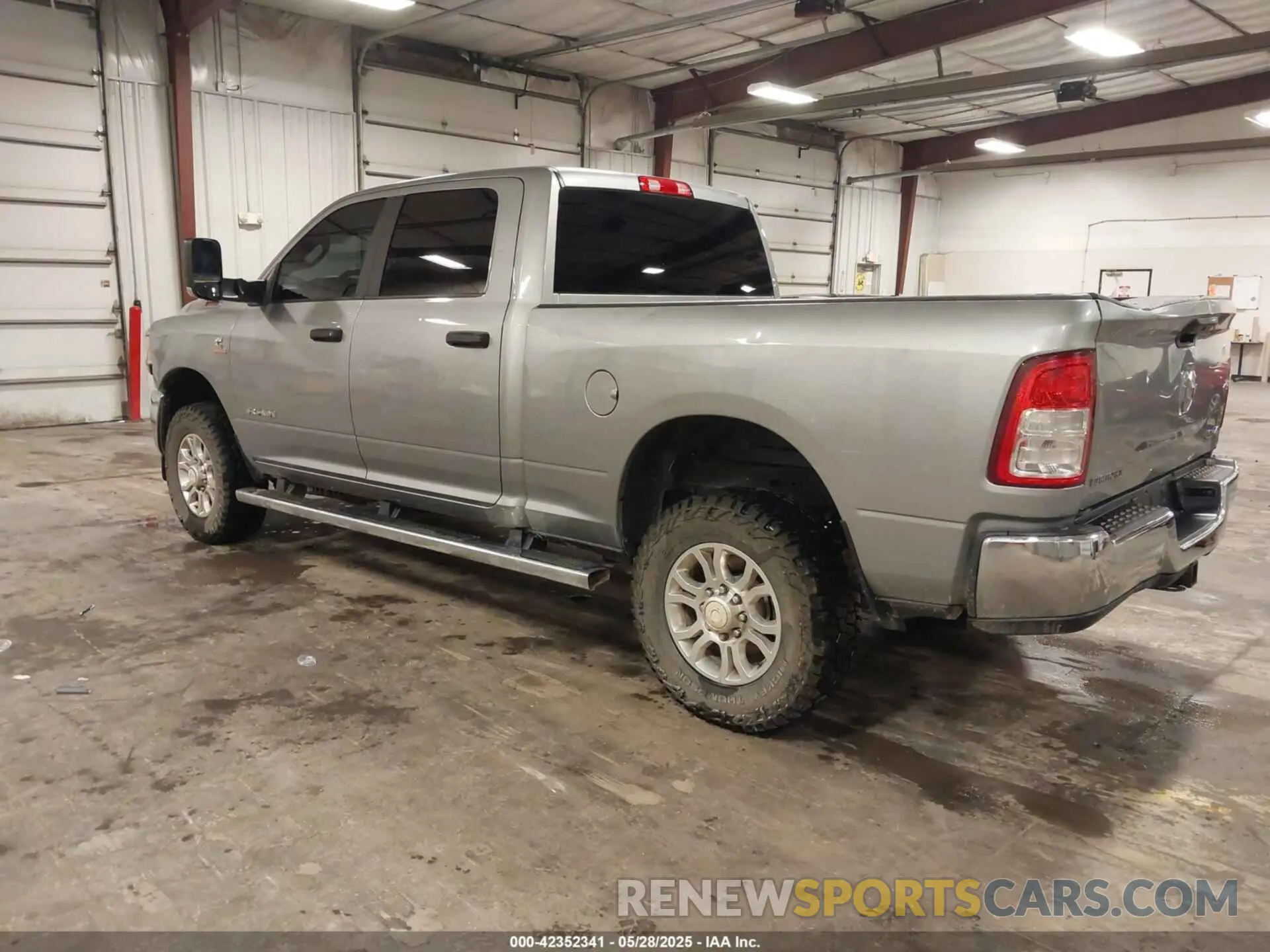 3 Photograph of a damaged car 3C6UR5DL0NG370058 RAM 2500 2022
