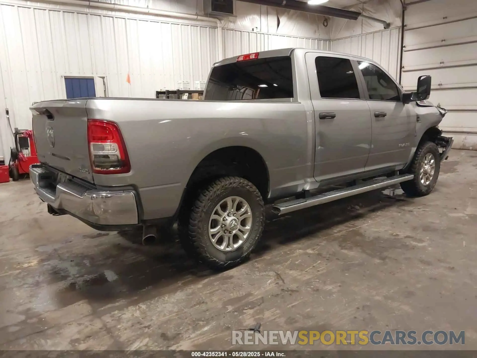 4 Photograph of a damaged car 3C6UR5DL0NG370058 RAM 2500 2022