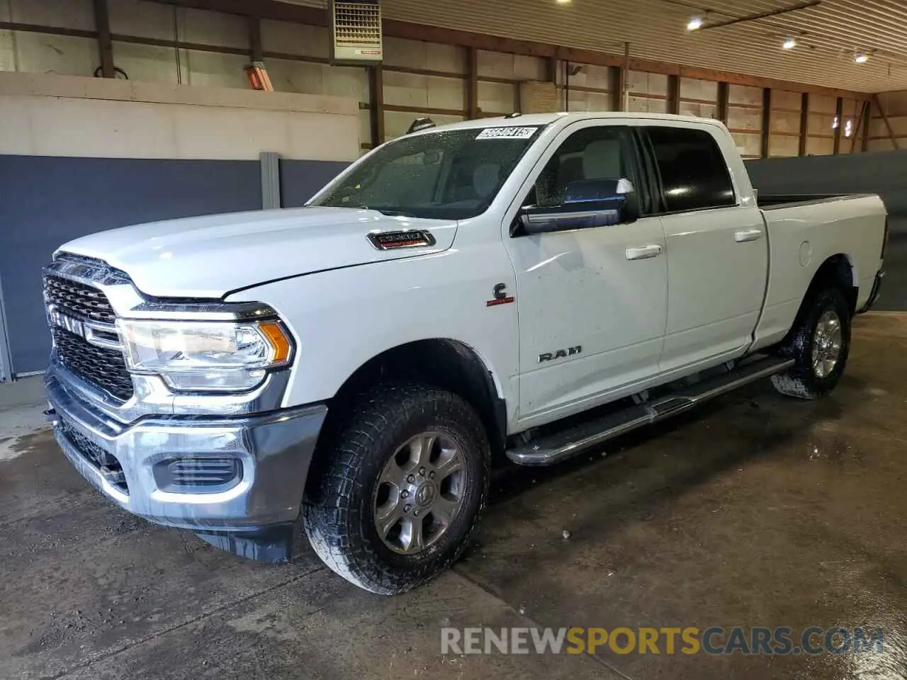 1 Photograph of a damaged car 3C6UR5DL1NG155465 RAM 2500 2022