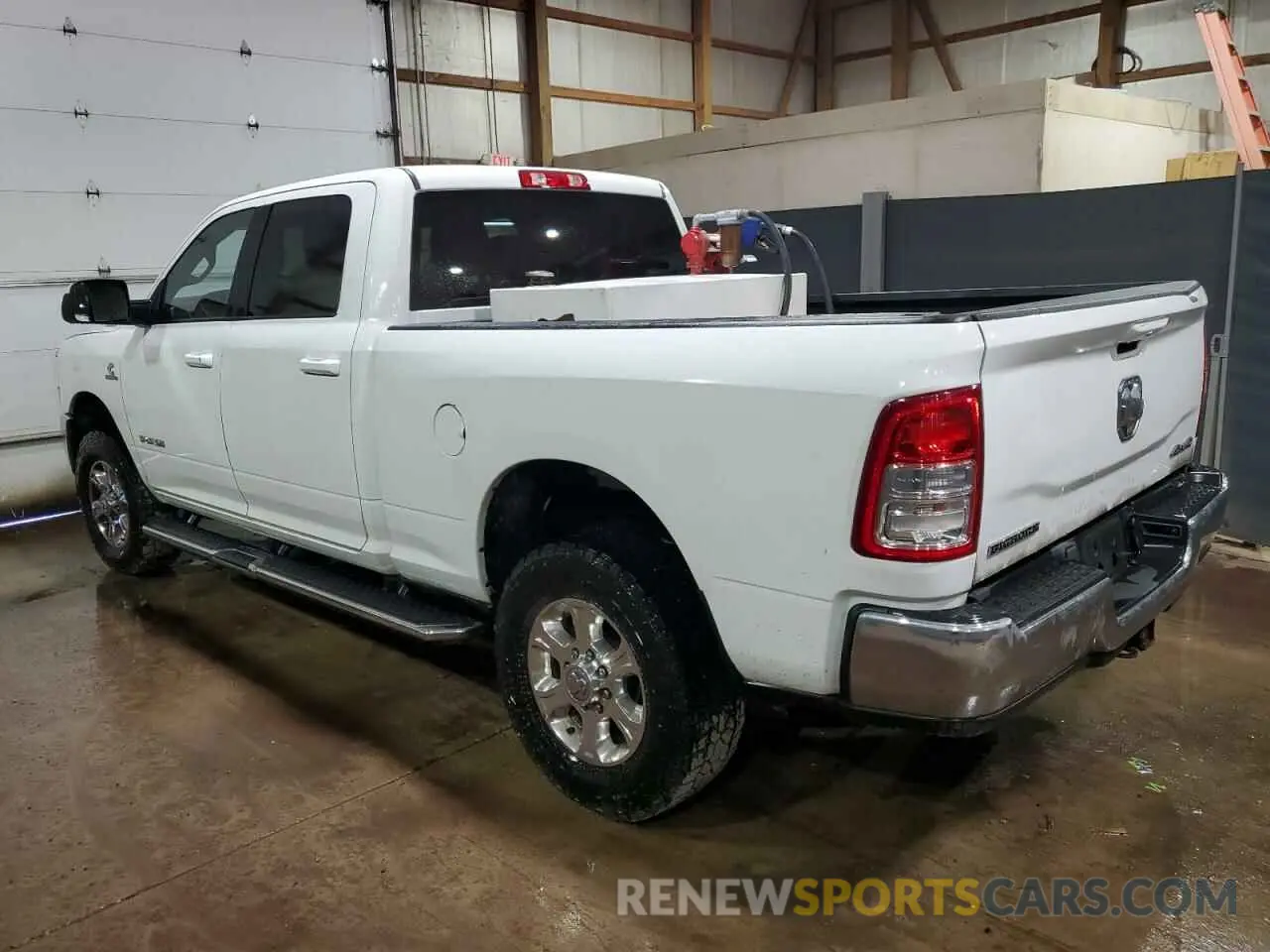 2 Photograph of a damaged car 3C6UR5DL1NG155465 RAM 2500 2022
