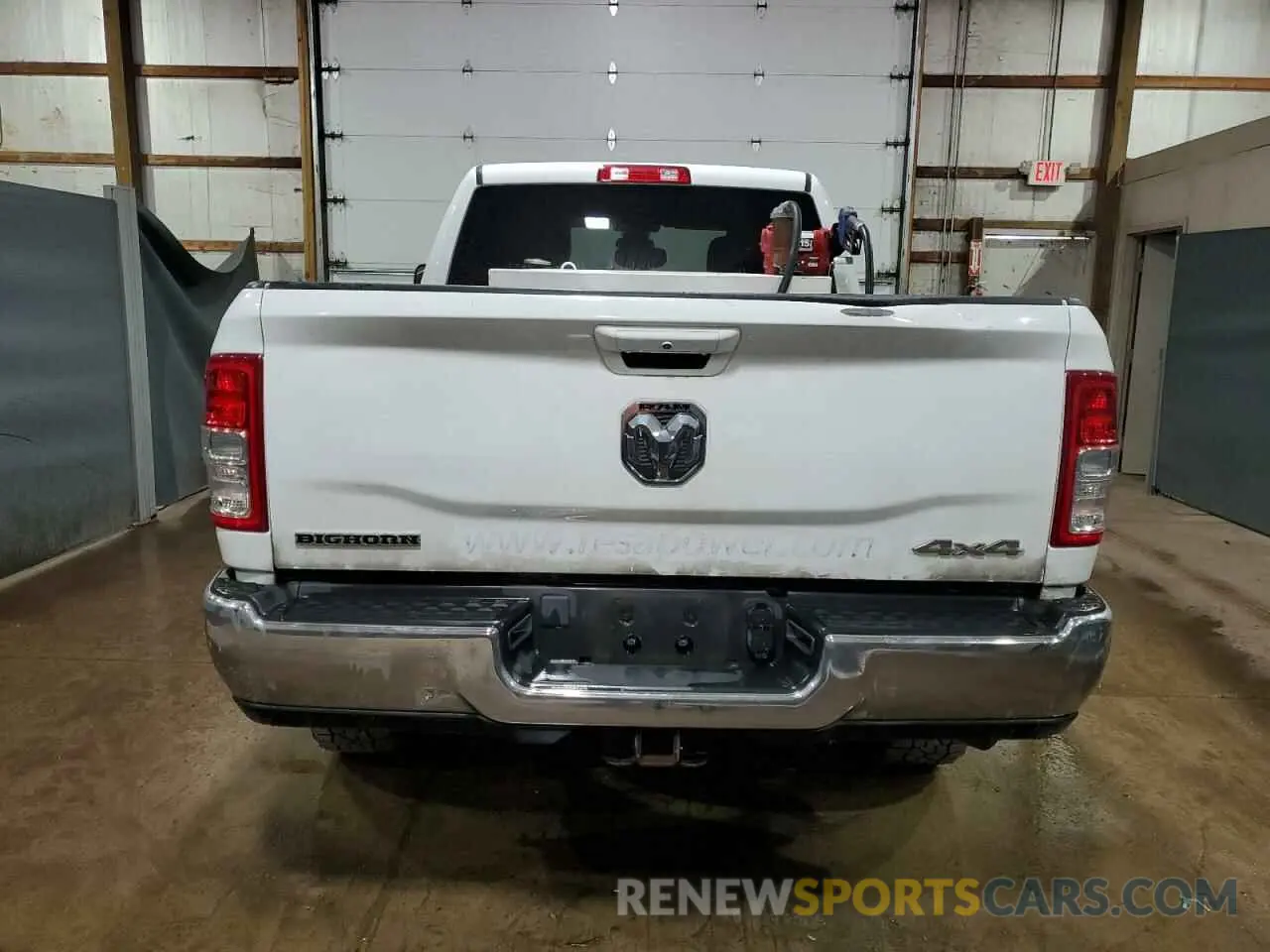 6 Photograph of a damaged car 3C6UR5DL1NG155465 RAM 2500 2022