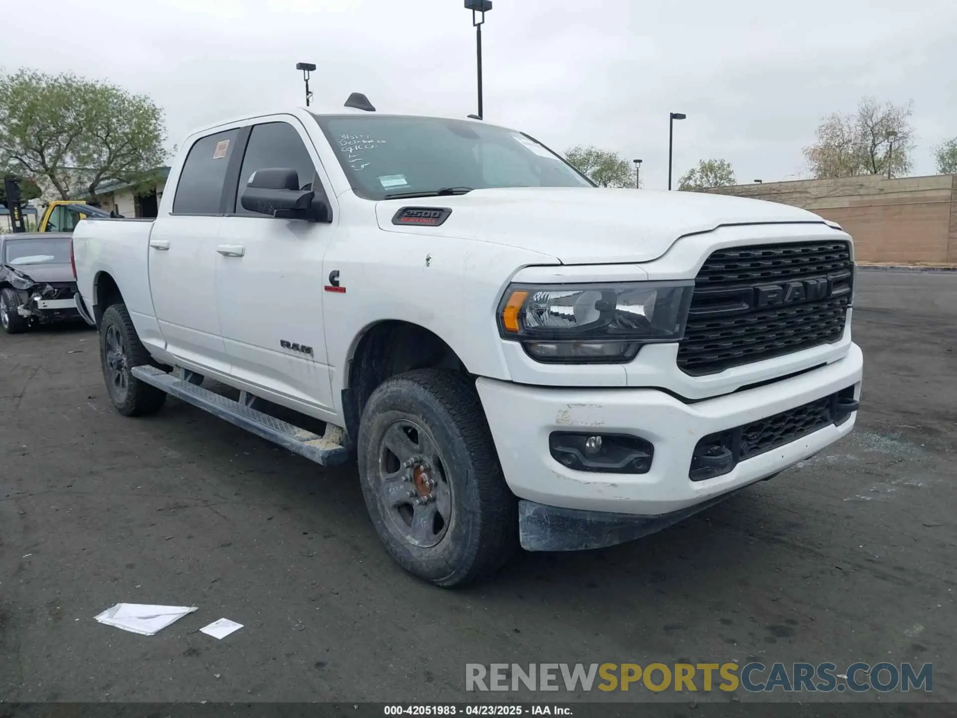 1 Photograph of a damaged car 3C6UR5DL1NG157135 RAM 2500 2022