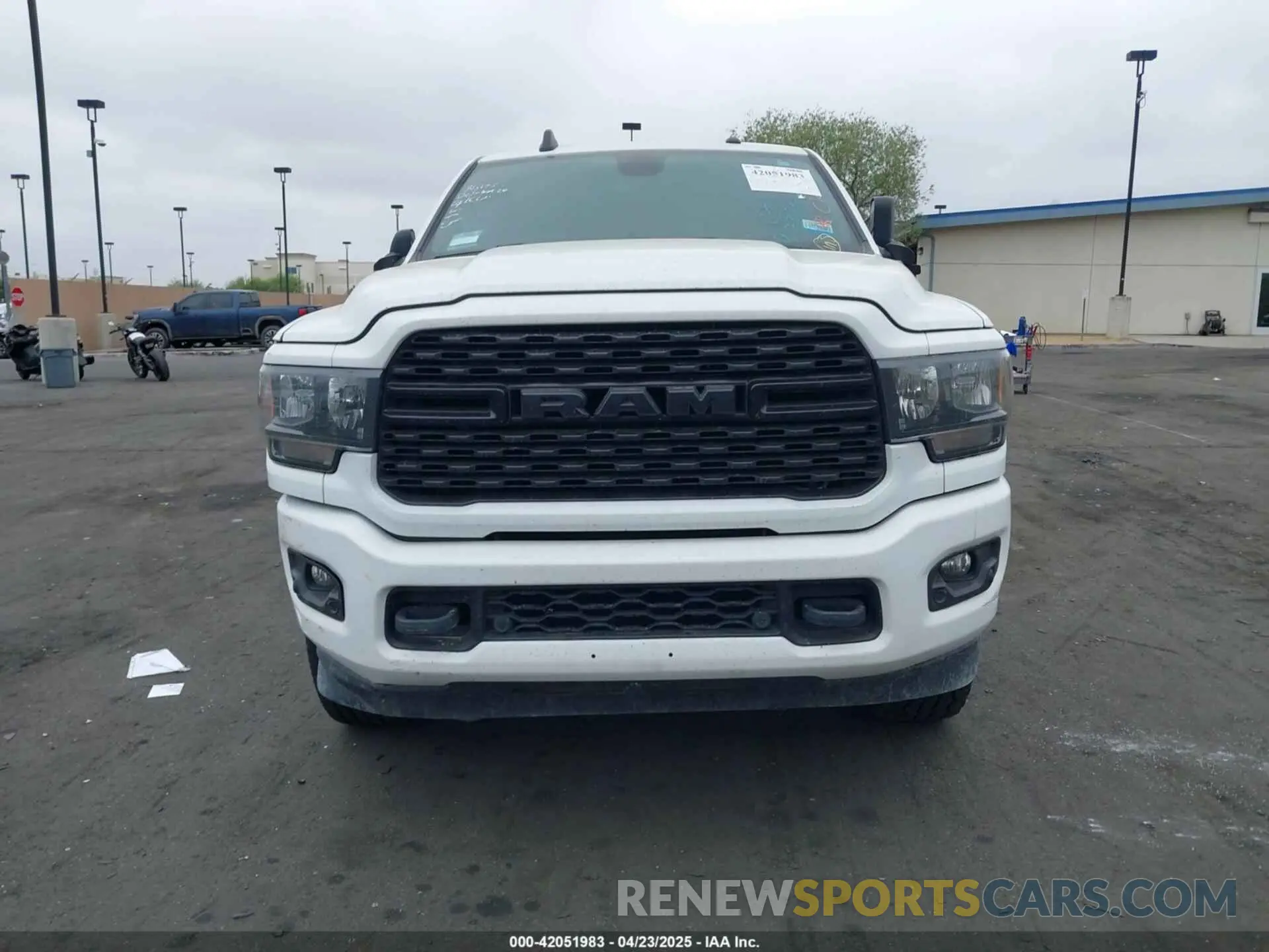13 Photograph of a damaged car 3C6UR5DL1NG157135 RAM 2500 2022