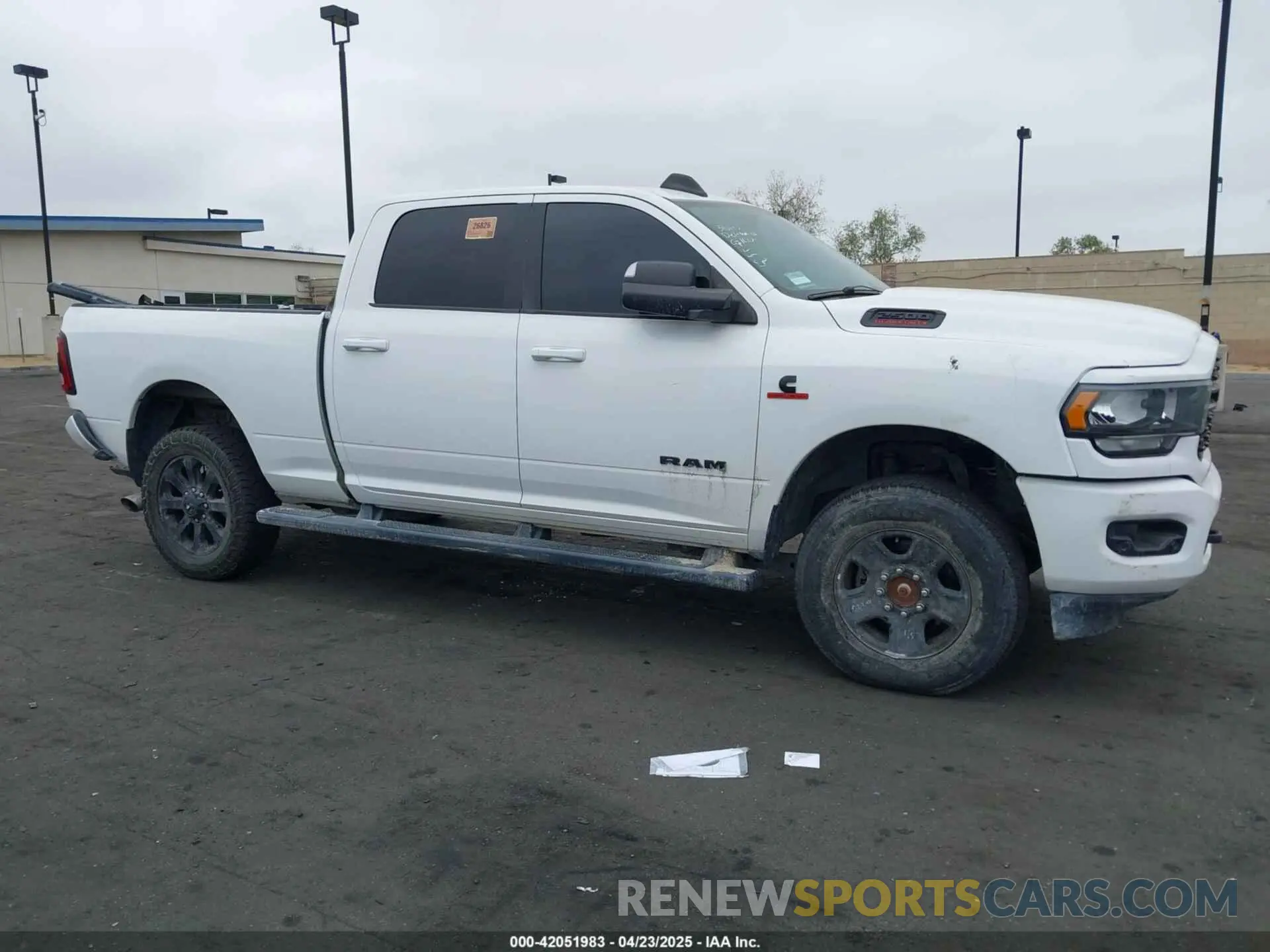 14 Photograph of a damaged car 3C6UR5DL1NG157135 RAM 2500 2022