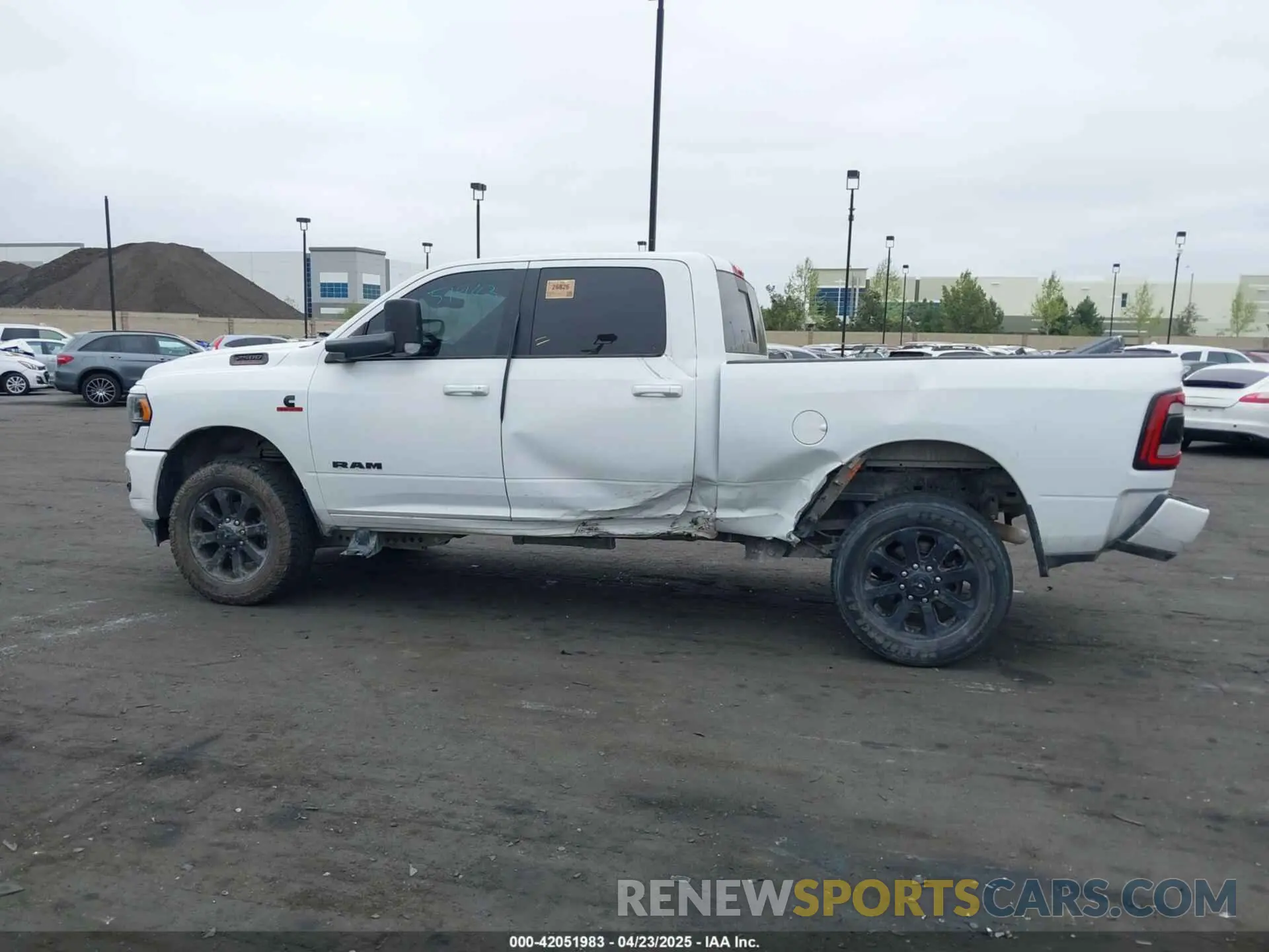 15 Photograph of a damaged car 3C6UR5DL1NG157135 RAM 2500 2022