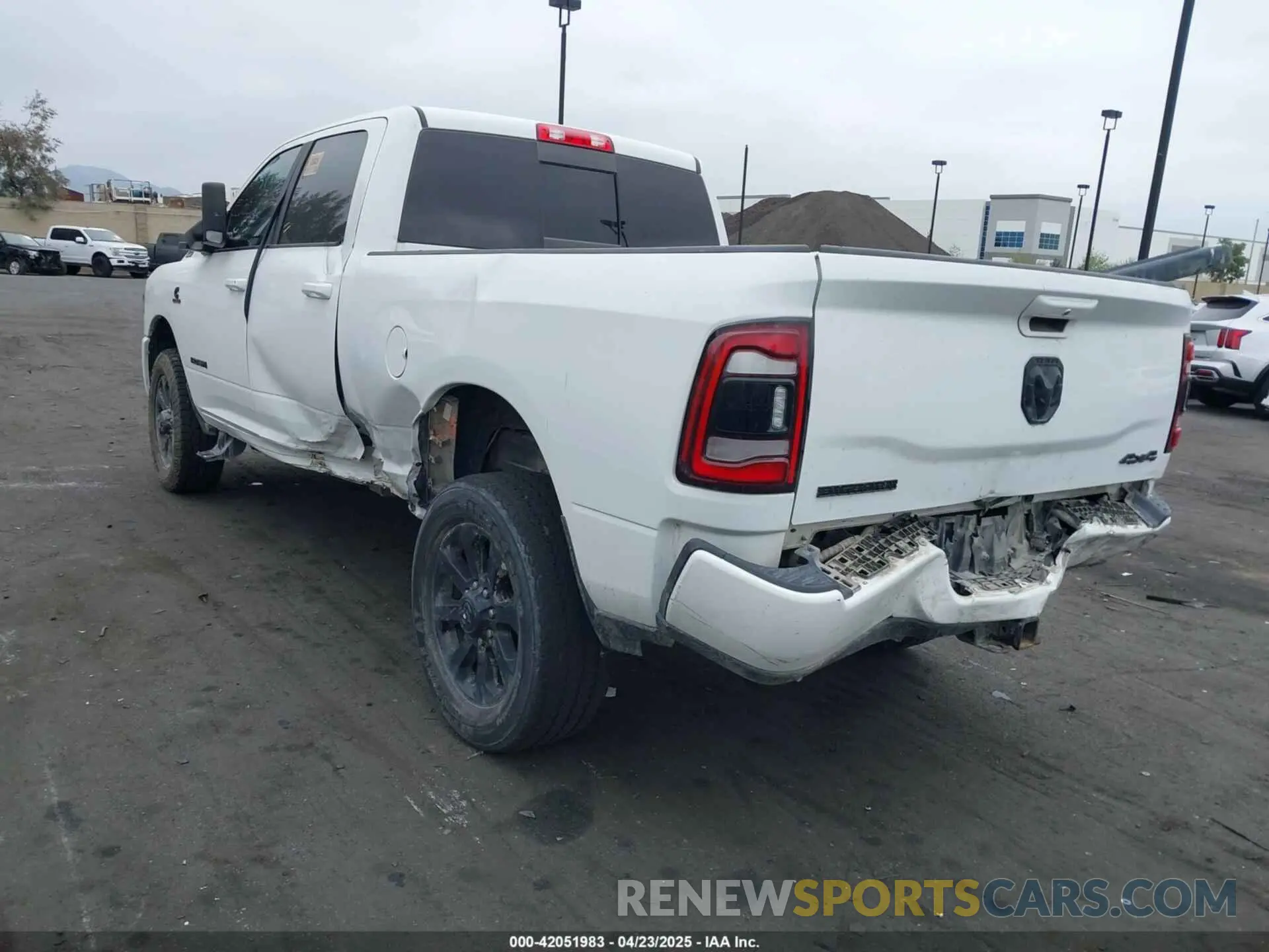 3 Photograph of a damaged car 3C6UR5DL1NG157135 RAM 2500 2022