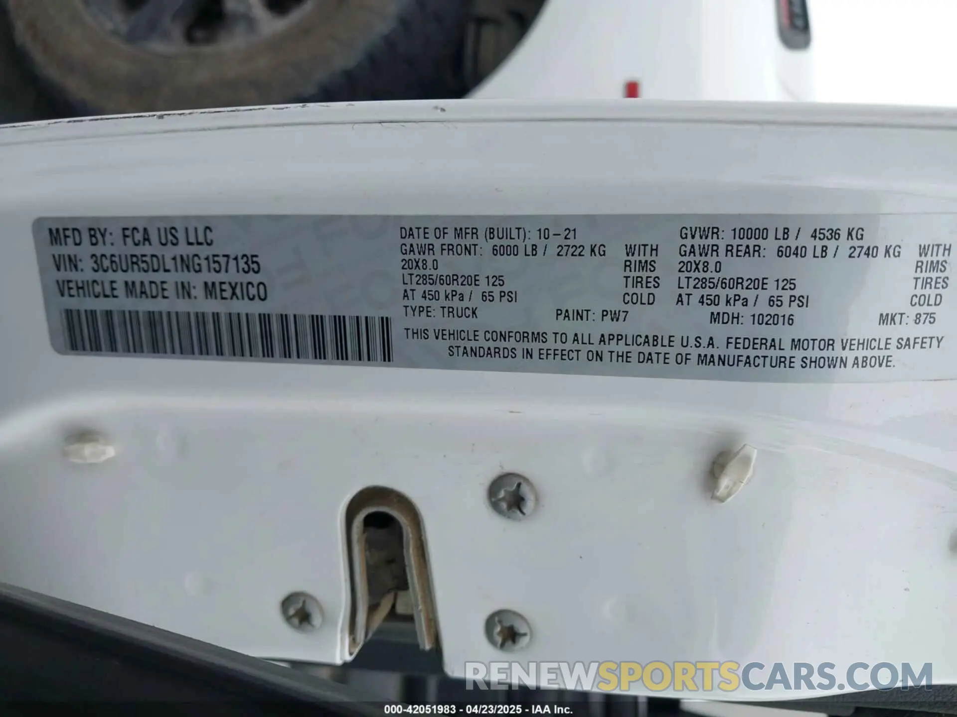 9 Photograph of a damaged car 3C6UR5DL1NG157135 RAM 2500 2022