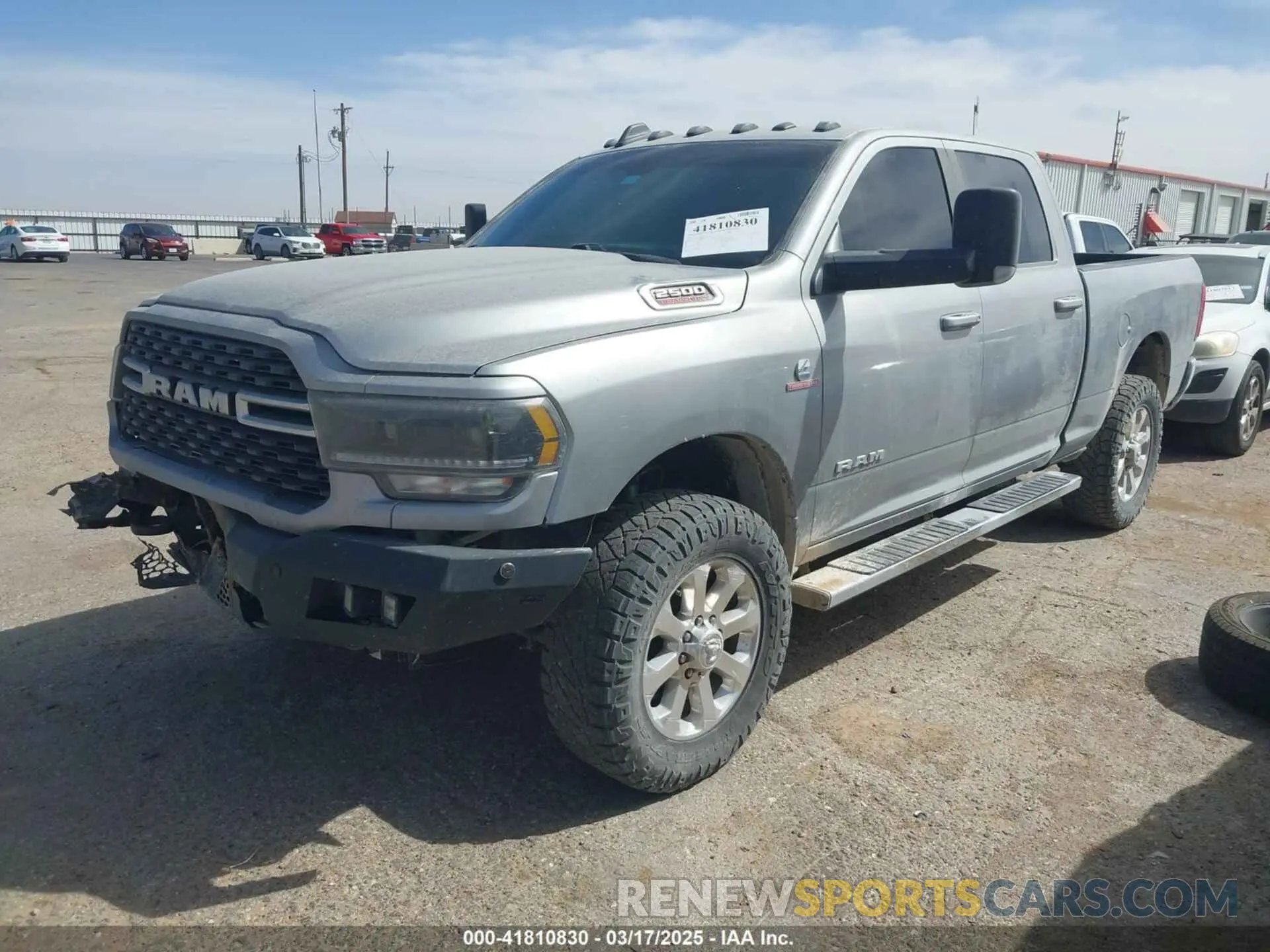 2 Photograph of a damaged car 3C6UR5DL1NG178793 RAM 2500 2022