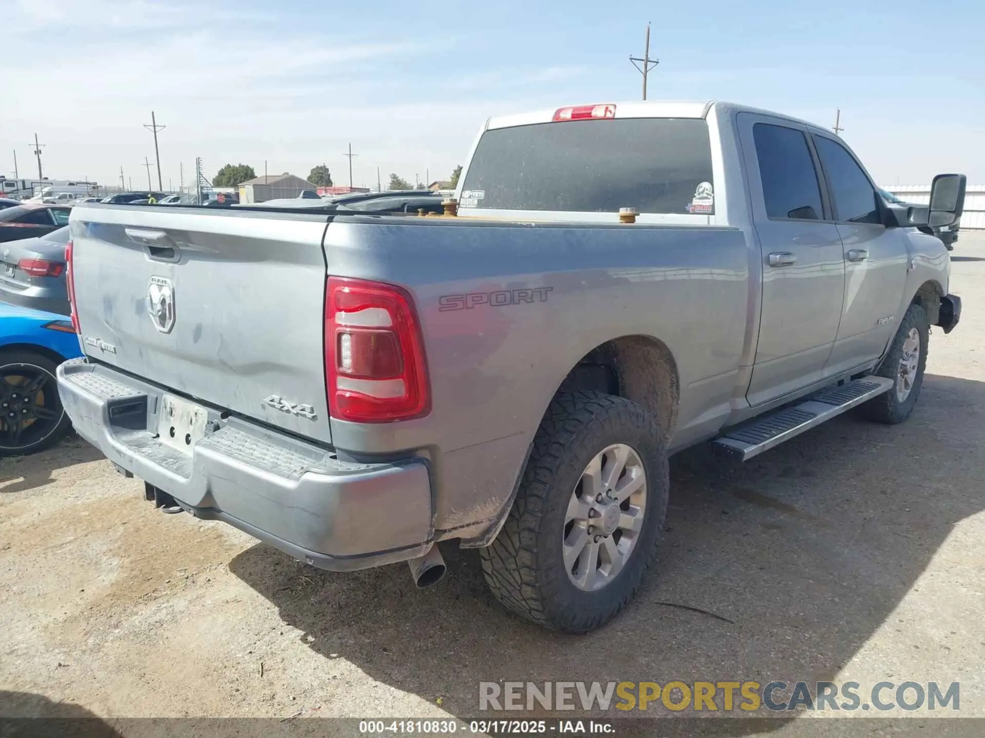 4 Photograph of a damaged car 3C6UR5DL1NG178793 RAM 2500 2022