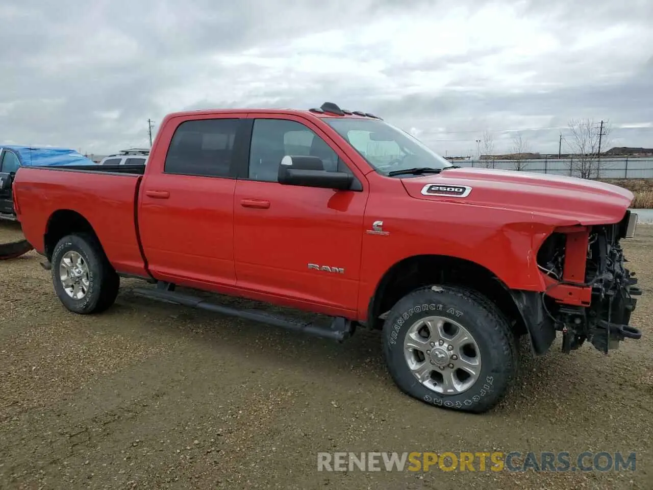 4 Photograph of a damaged car 3C6UR5DL1NG383000 RAM 2500 2022