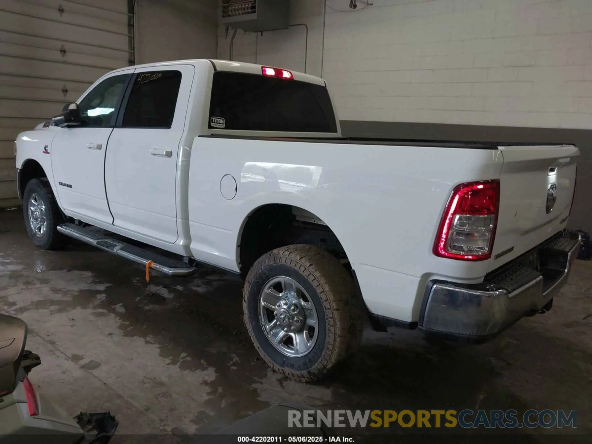 3 Photograph of a damaged car 3C6UR5DL1NG436374 RAM 2500 2022