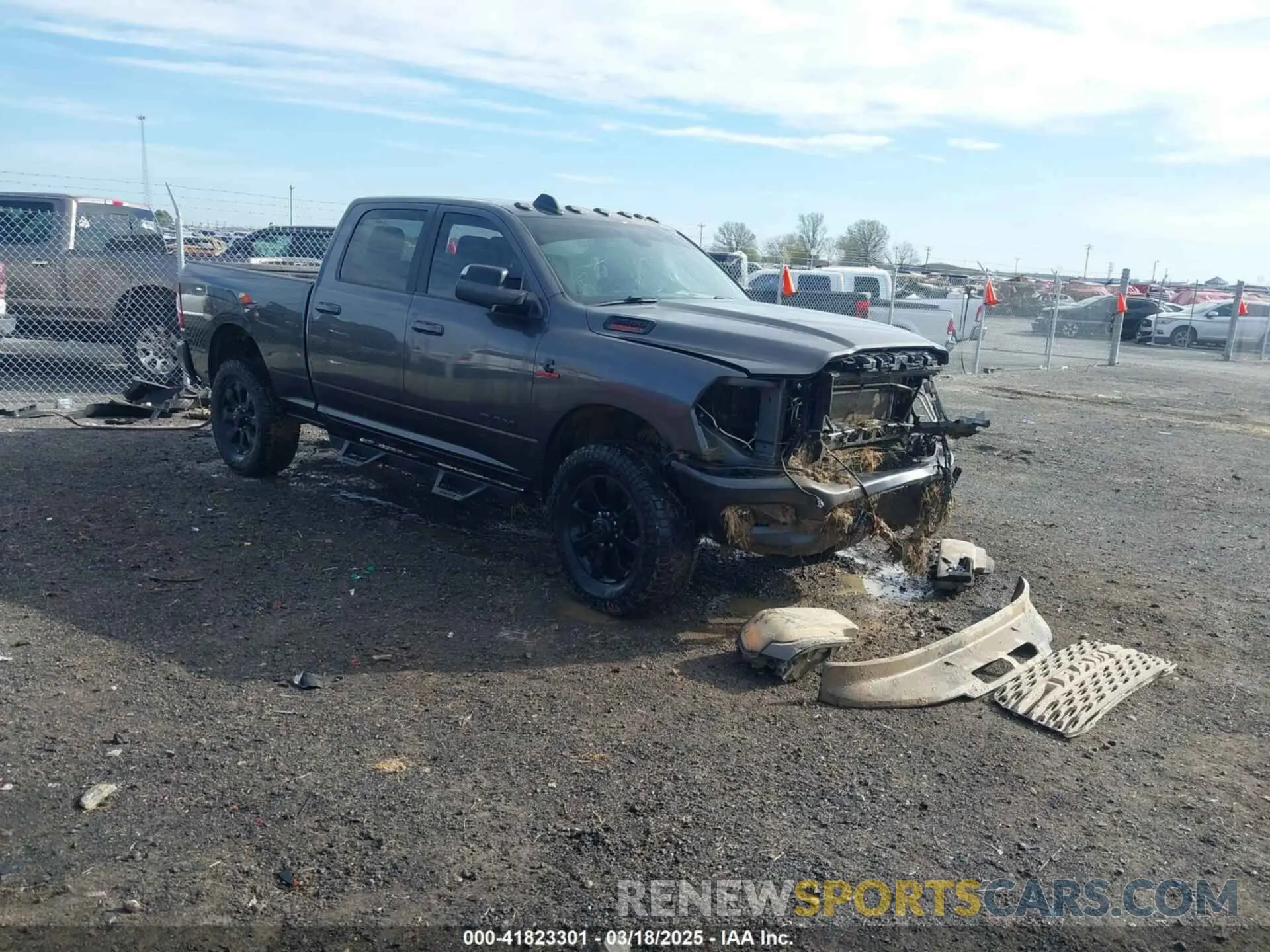 1 Photograph of a damaged car 3C6UR5DL2NG167320 RAM 2500 2022