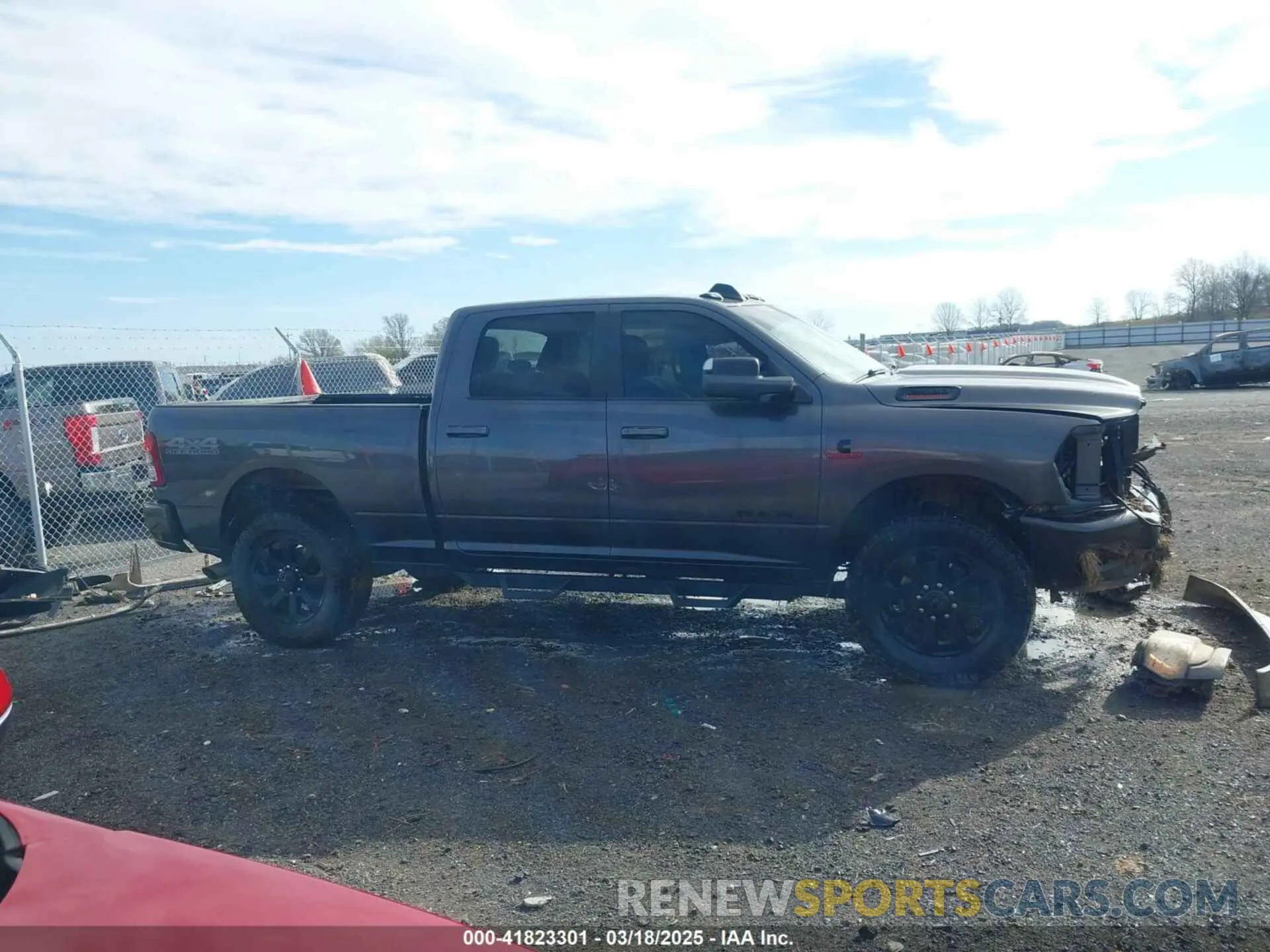 14 Photograph of a damaged car 3C6UR5DL2NG167320 RAM 2500 2022