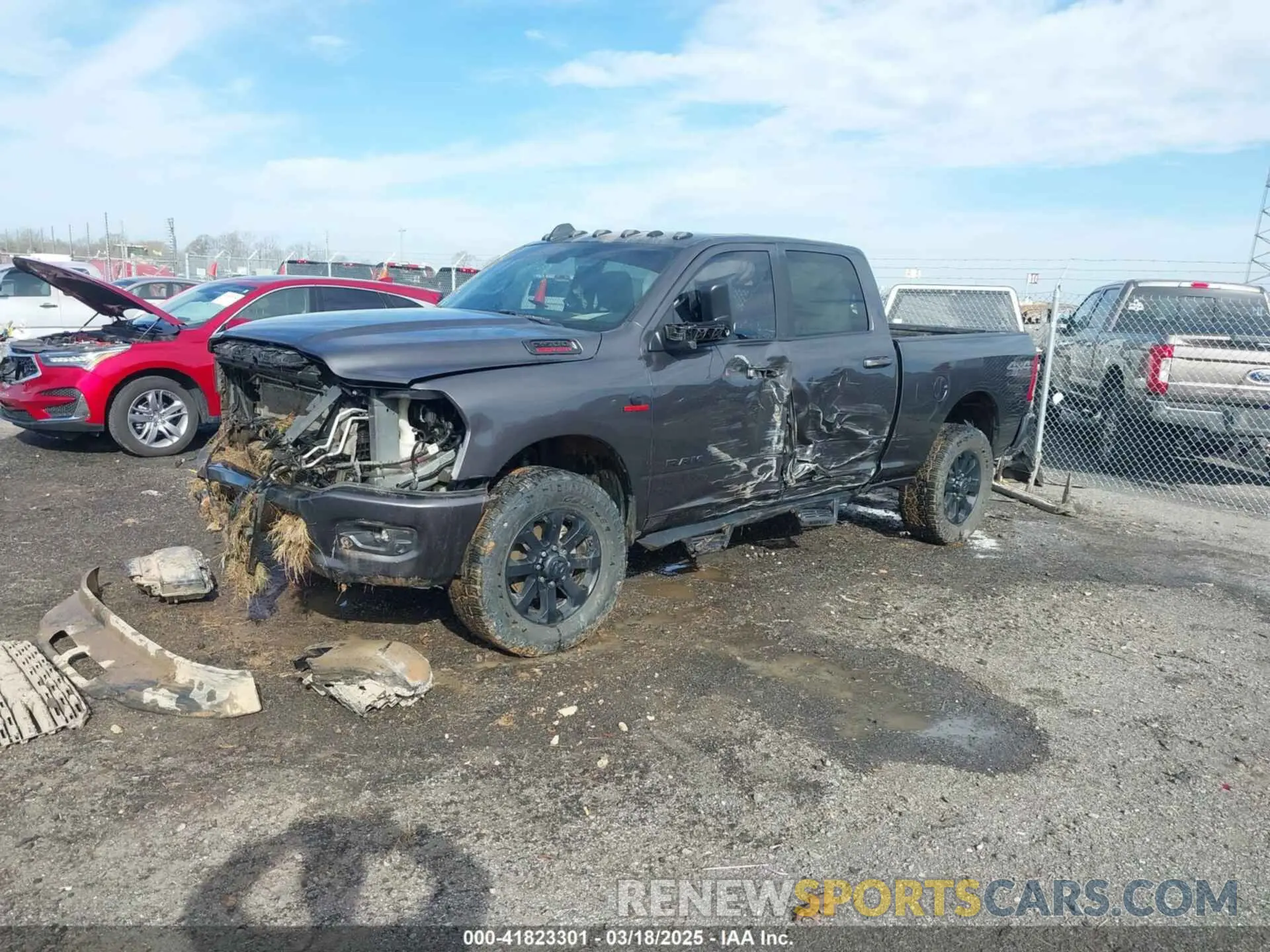 2 Photograph of a damaged car 3C6UR5DL2NG167320 RAM 2500 2022