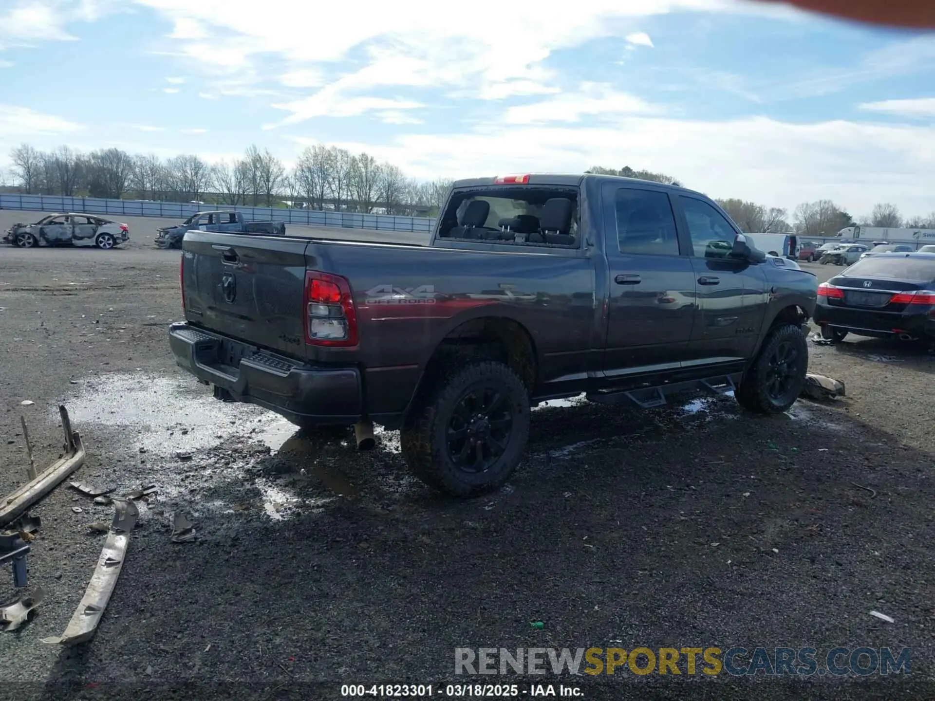 4 Photograph of a damaged car 3C6UR5DL2NG167320 RAM 2500 2022