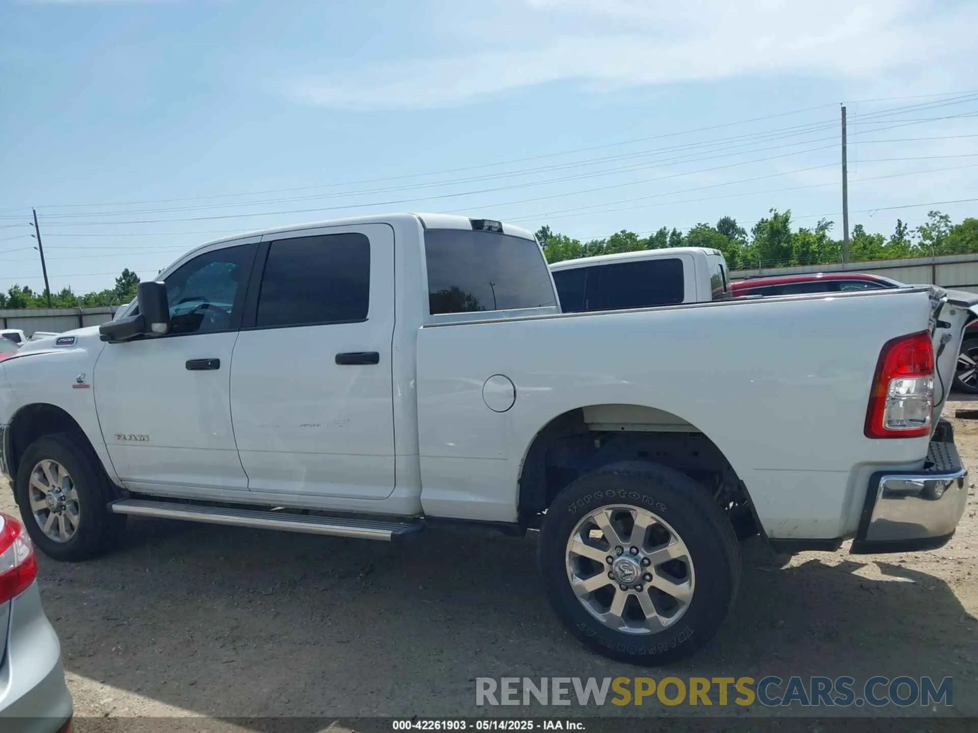 14 Photograph of a damaged car 3C6UR5DL2NG350071 RAM 2500 2022