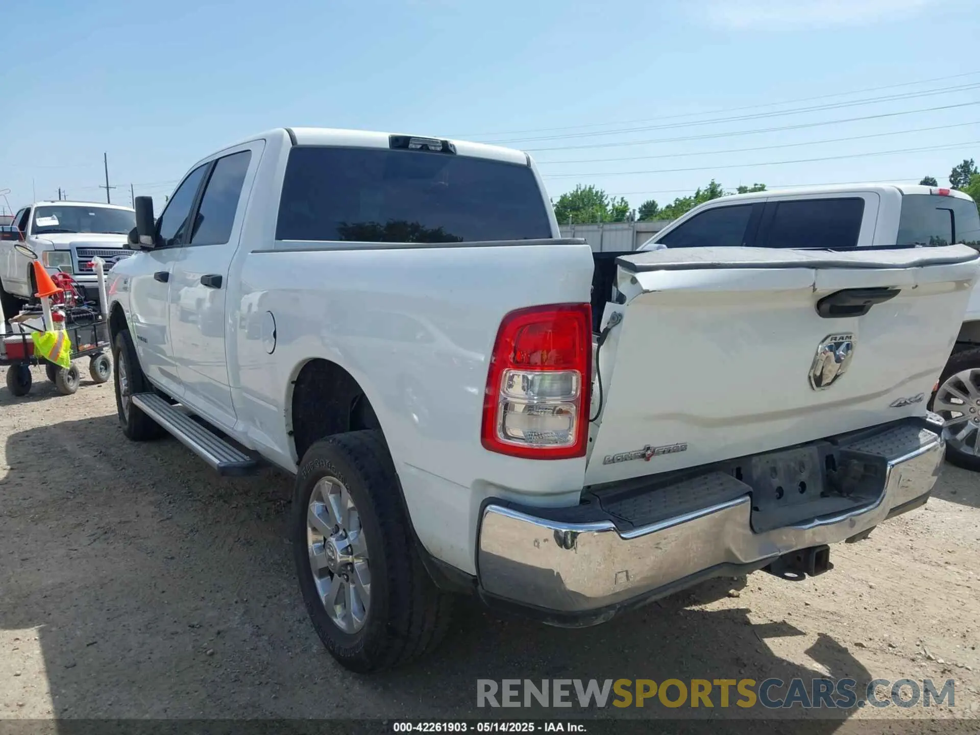 3 Photograph of a damaged car 3C6UR5DL2NG350071 RAM 2500 2022