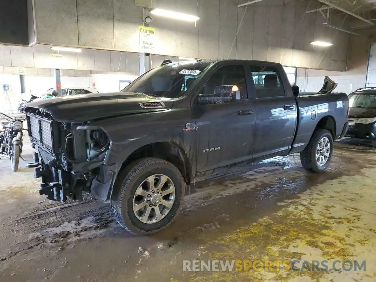 1 Photograph of a damaged car 3C6UR5DL3NG171067 RAM 2500 2022