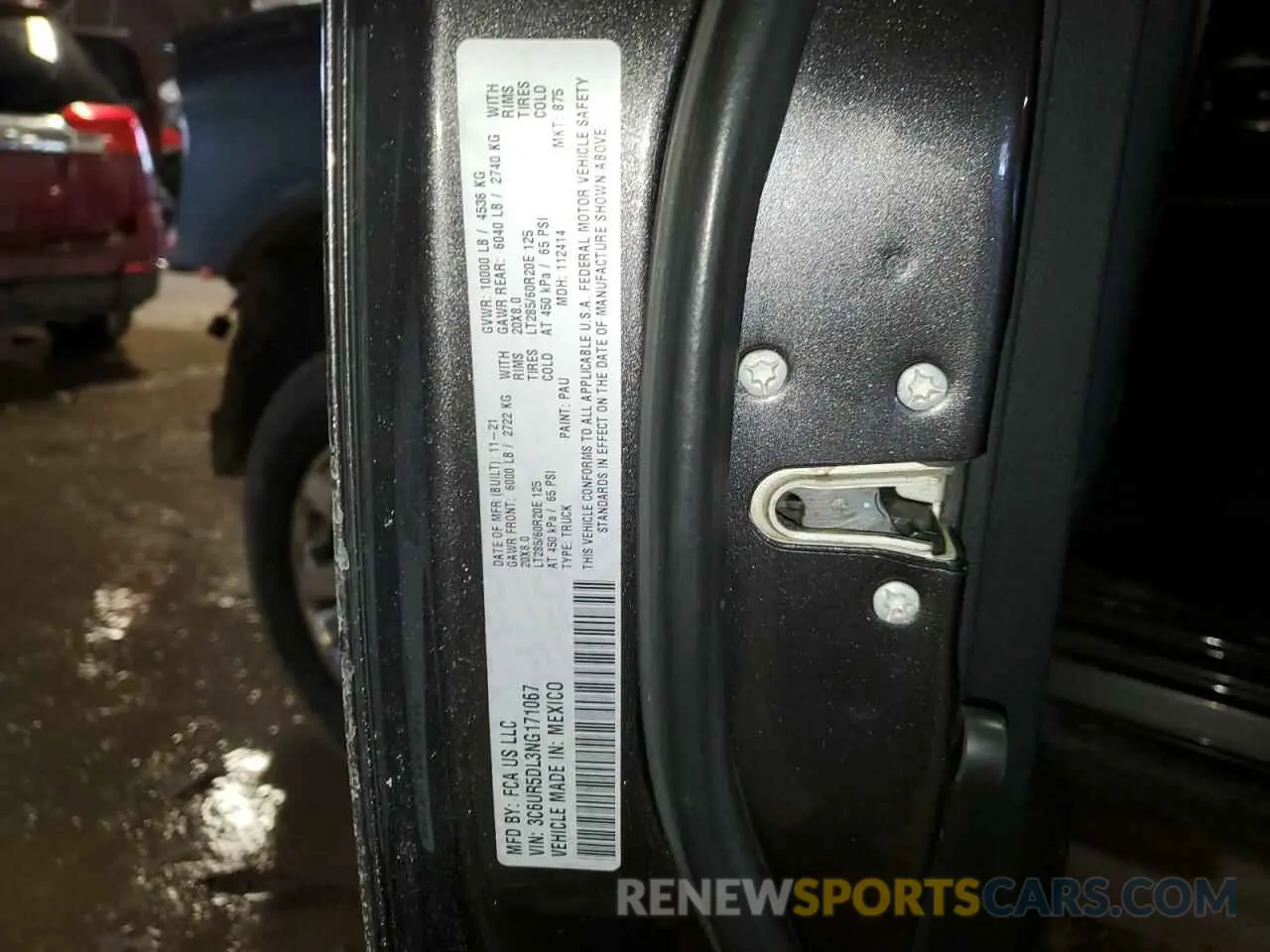 15 Photograph of a damaged car 3C6UR5DL3NG171067 RAM 2500 2022