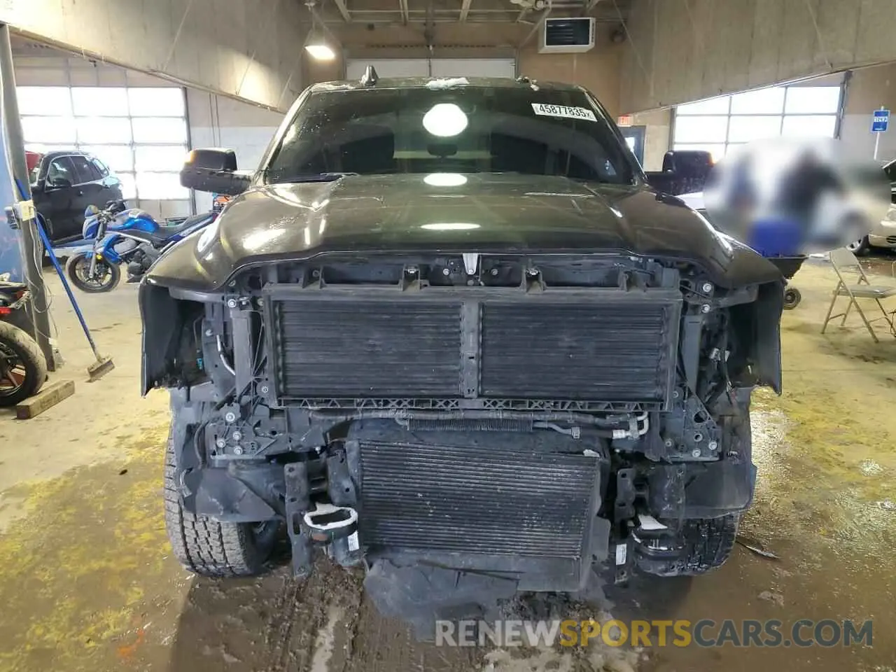 5 Photograph of a damaged car 3C6UR5DL3NG171067 RAM 2500 2022