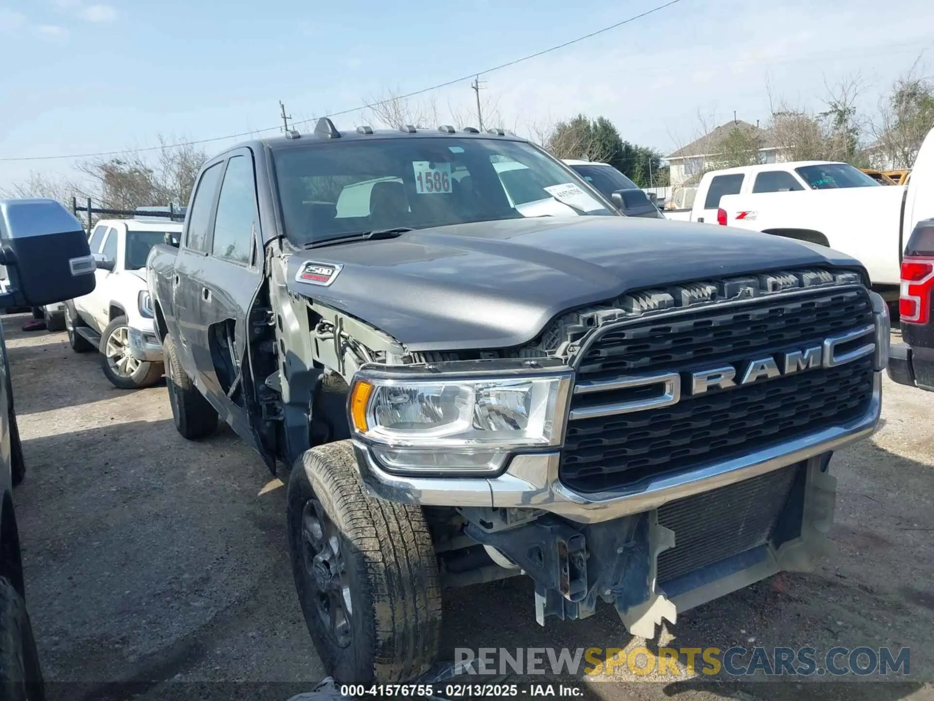 1 Photograph of a damaged car 3C6UR5DL3NG253493 RAM 2500 2022