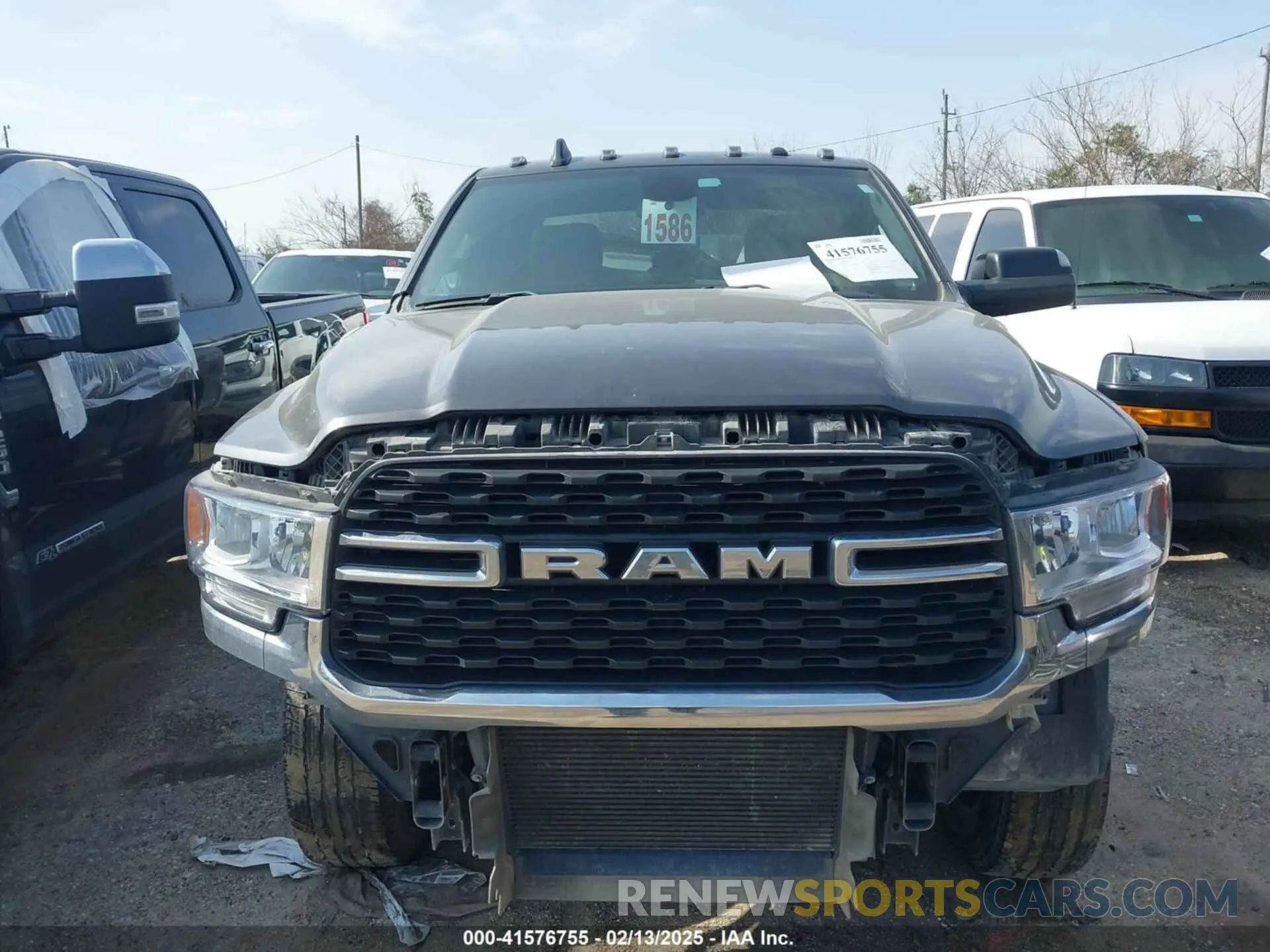 13 Photograph of a damaged car 3C6UR5DL3NG253493 RAM 2500 2022