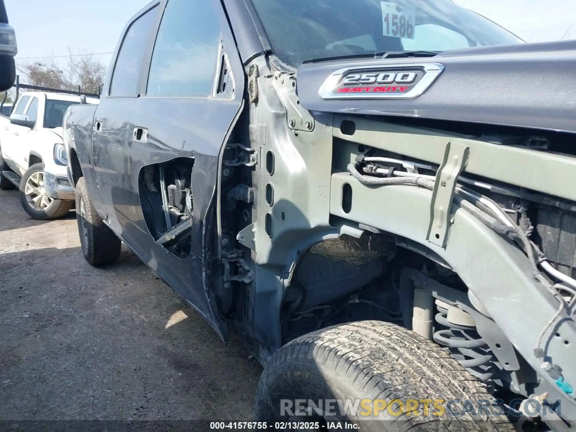 14 Photograph of a damaged car 3C6UR5DL3NG253493 RAM 2500 2022