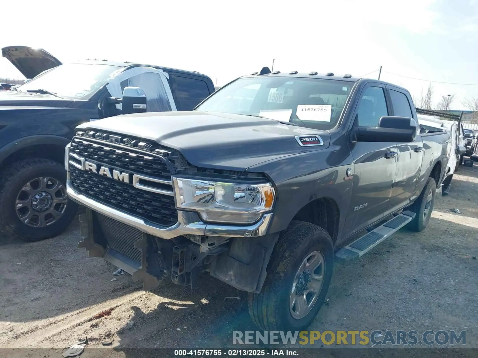 2 Photograph of a damaged car 3C6UR5DL3NG253493 RAM 2500 2022