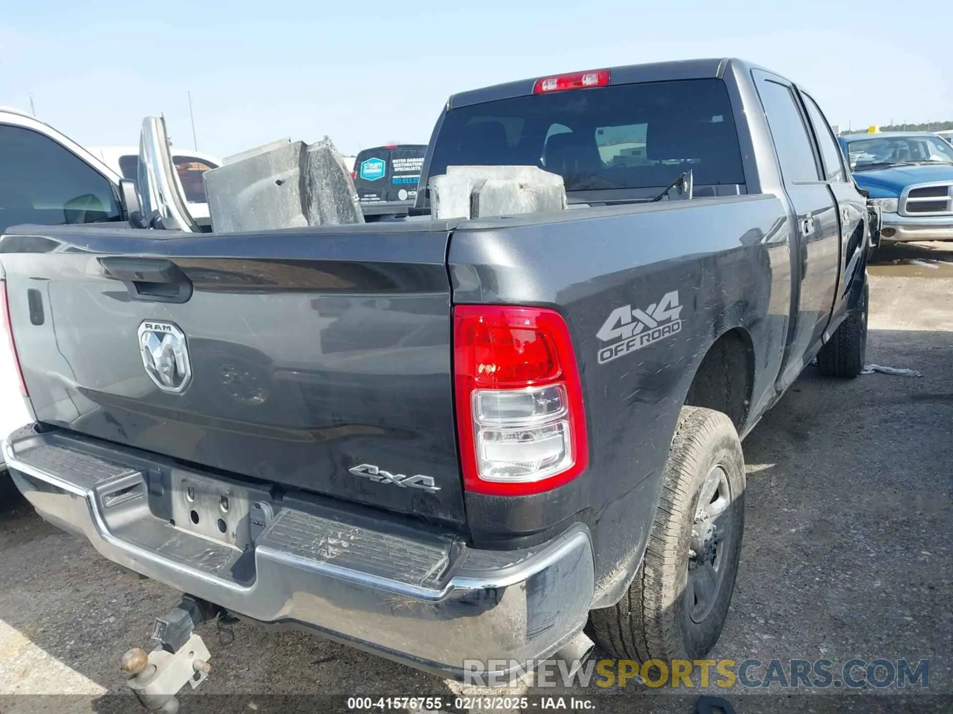 4 Photograph of a damaged car 3C6UR5DL3NG253493 RAM 2500 2022