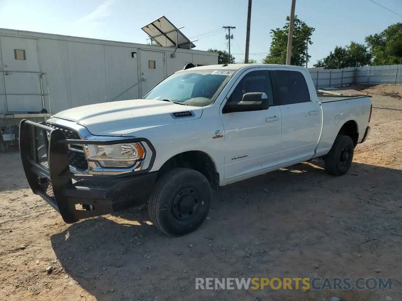 1 Photograph of a damaged car 3C6UR5DL3NG322697 RAM 2500 2022