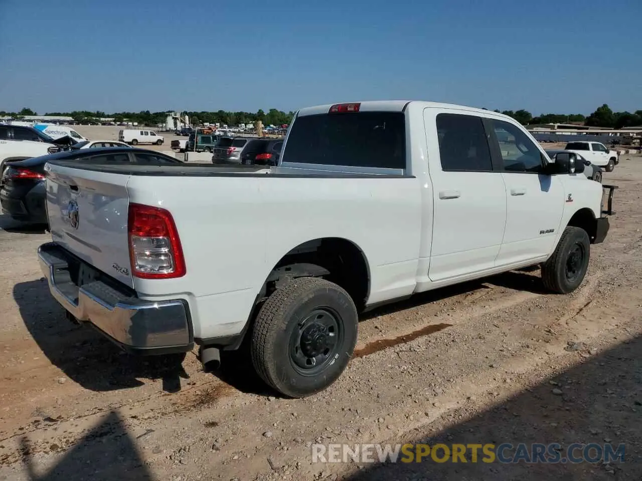 3 Photograph of a damaged car 3C6UR5DL3NG322697 RAM 2500 2022