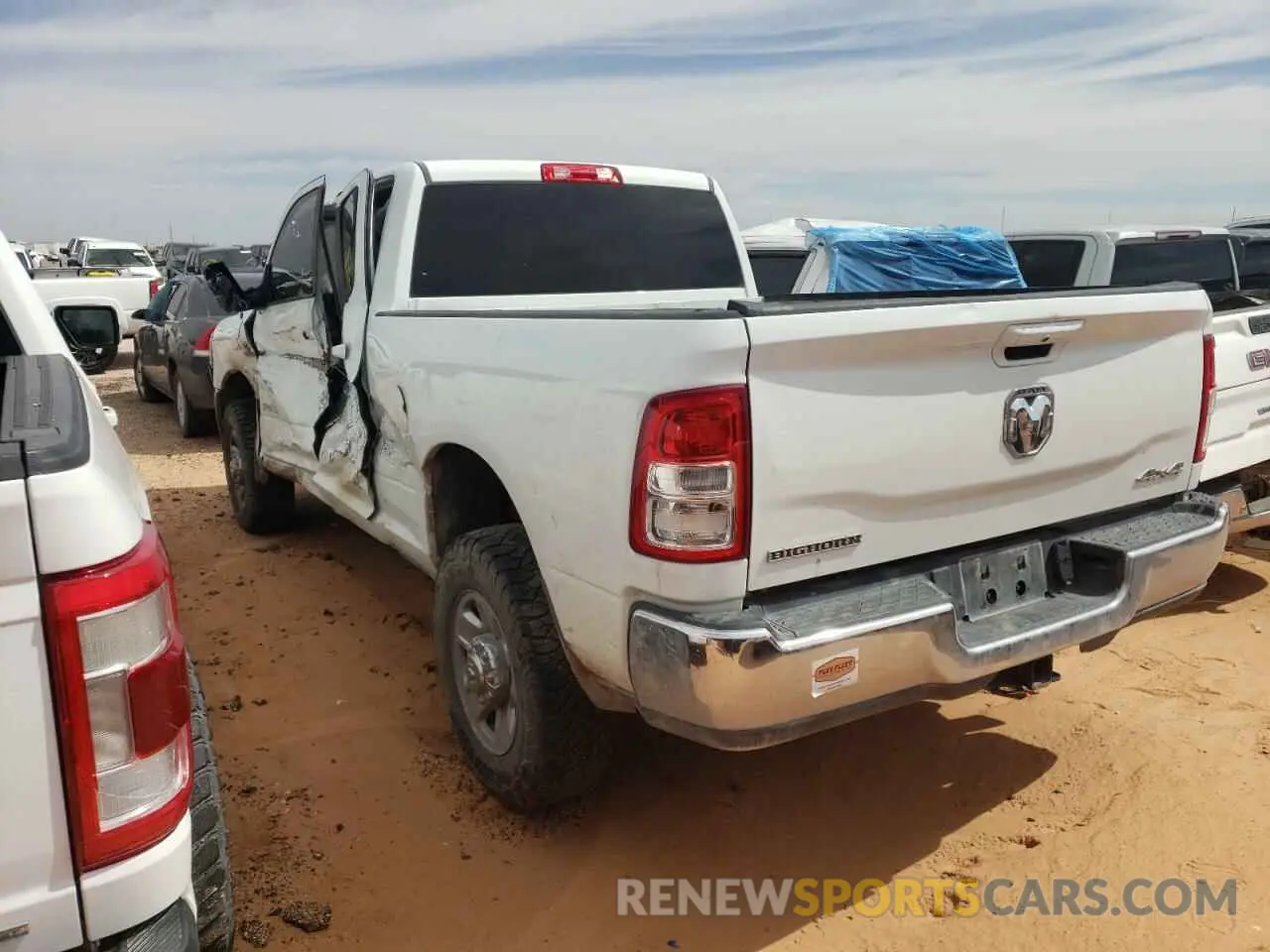 2 Photograph of a damaged car 3C6UR5DL3NG441138 RAM 2500 2022