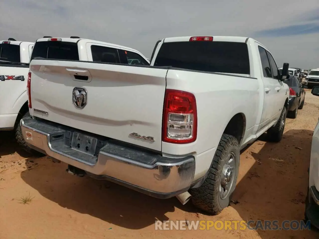 3 Photograph of a damaged car 3C6UR5DL3NG441138 RAM 2500 2022