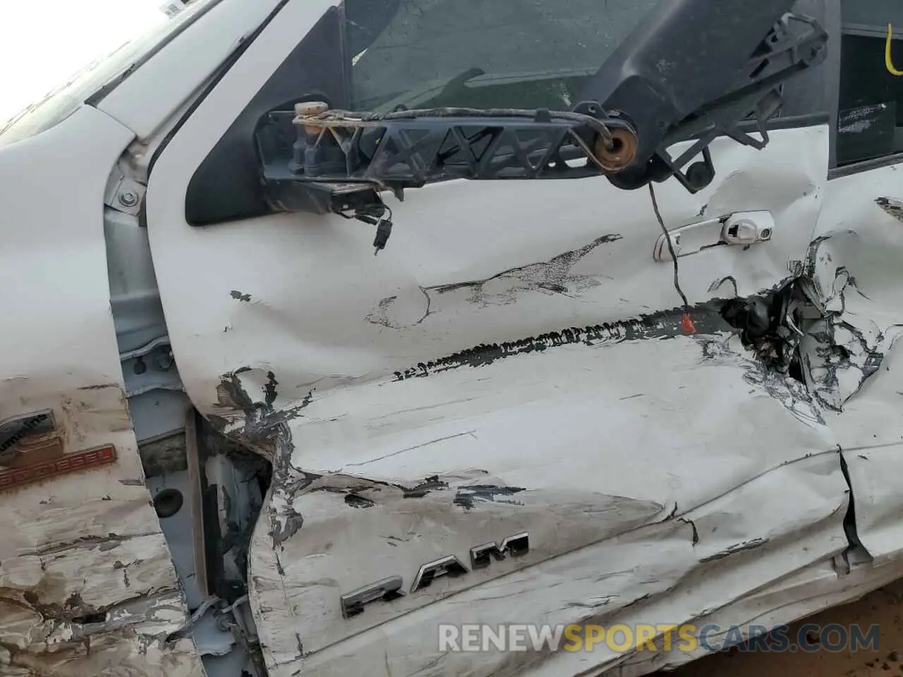 7 Photograph of a damaged car 3C6UR5DL3NG441138 RAM 2500 2022