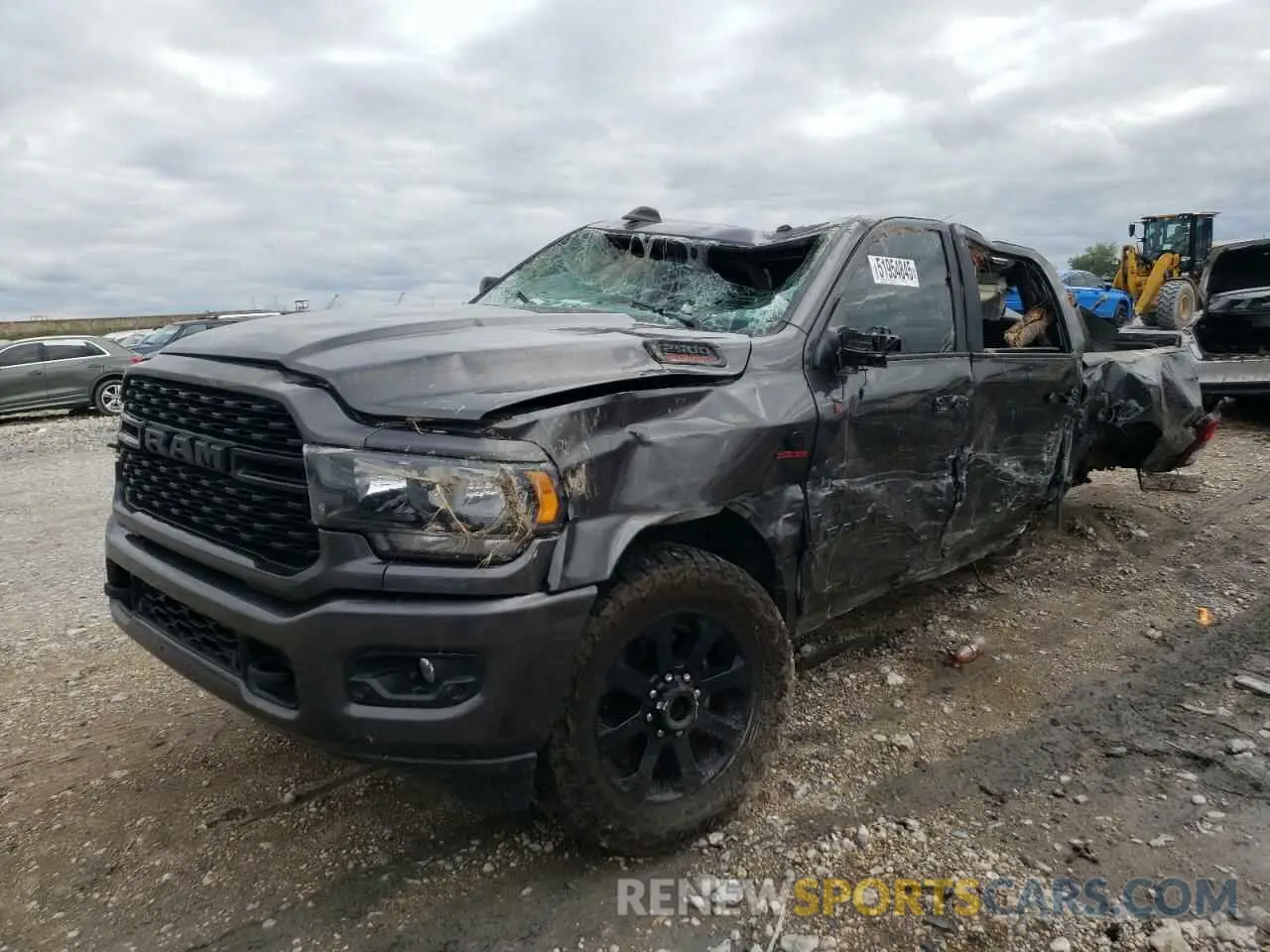 1 Photograph of a damaged car 3C6UR5DL4NG185799 RAM 2500 2022