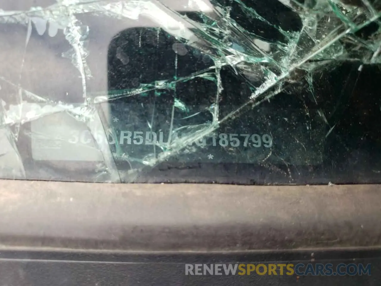 12 Photograph of a damaged car 3C6UR5DL4NG185799 RAM 2500 2022