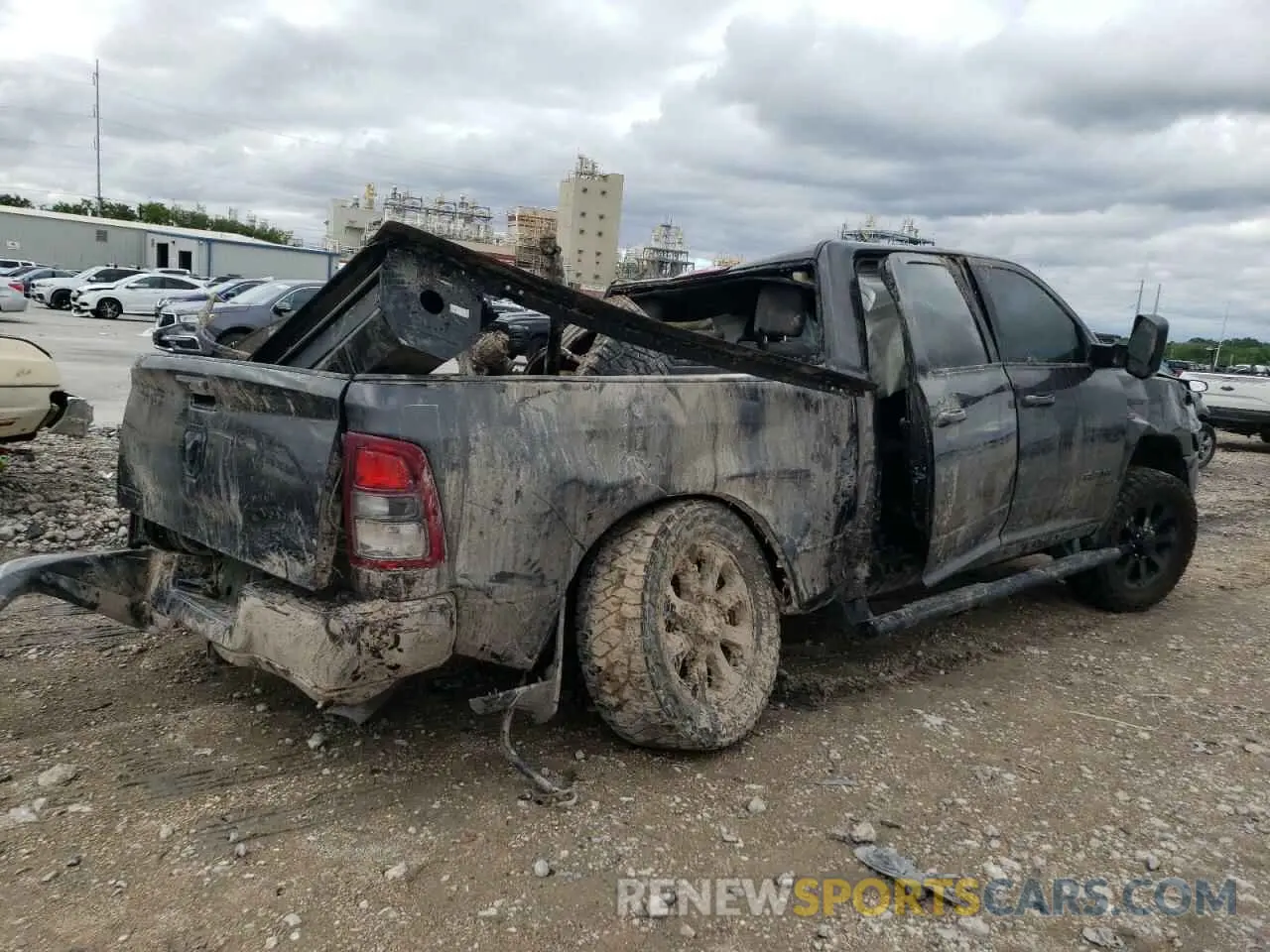 3 Photograph of a damaged car 3C6UR5DL4NG185799 RAM 2500 2022