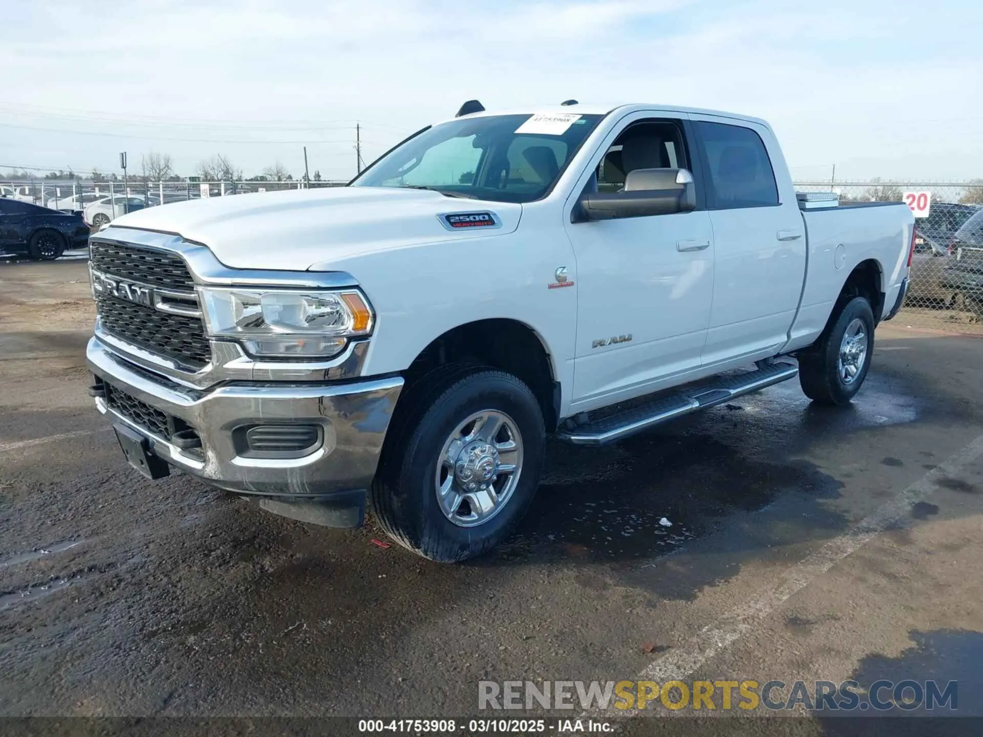 2 Photograph of a damaged car 3C6UR5DL4NG235715 RAM 2500 2022