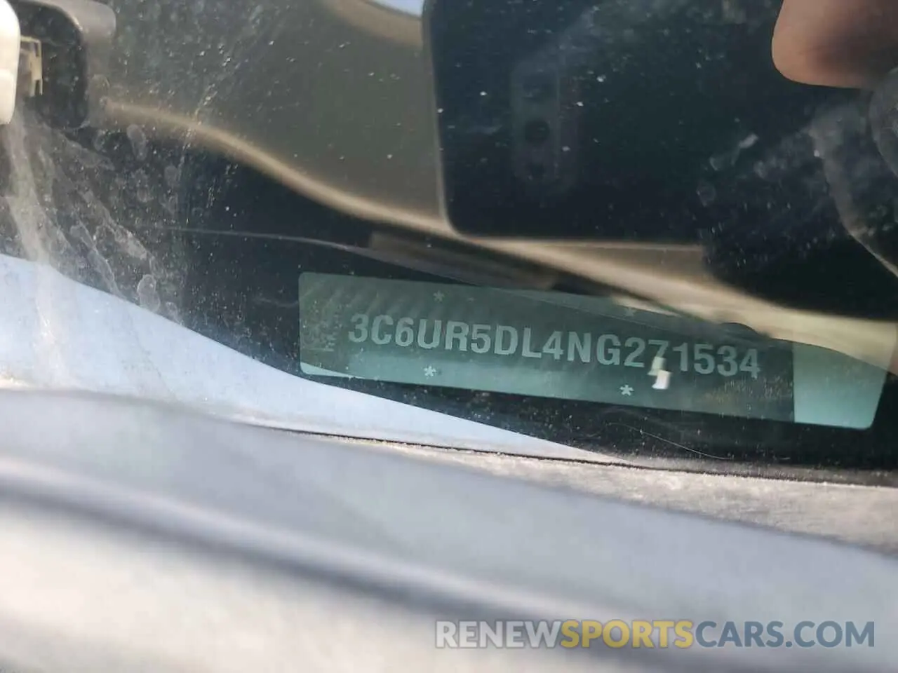 13 Photograph of a damaged car 3C6UR5DL4NG271534 RAM 2500 2022