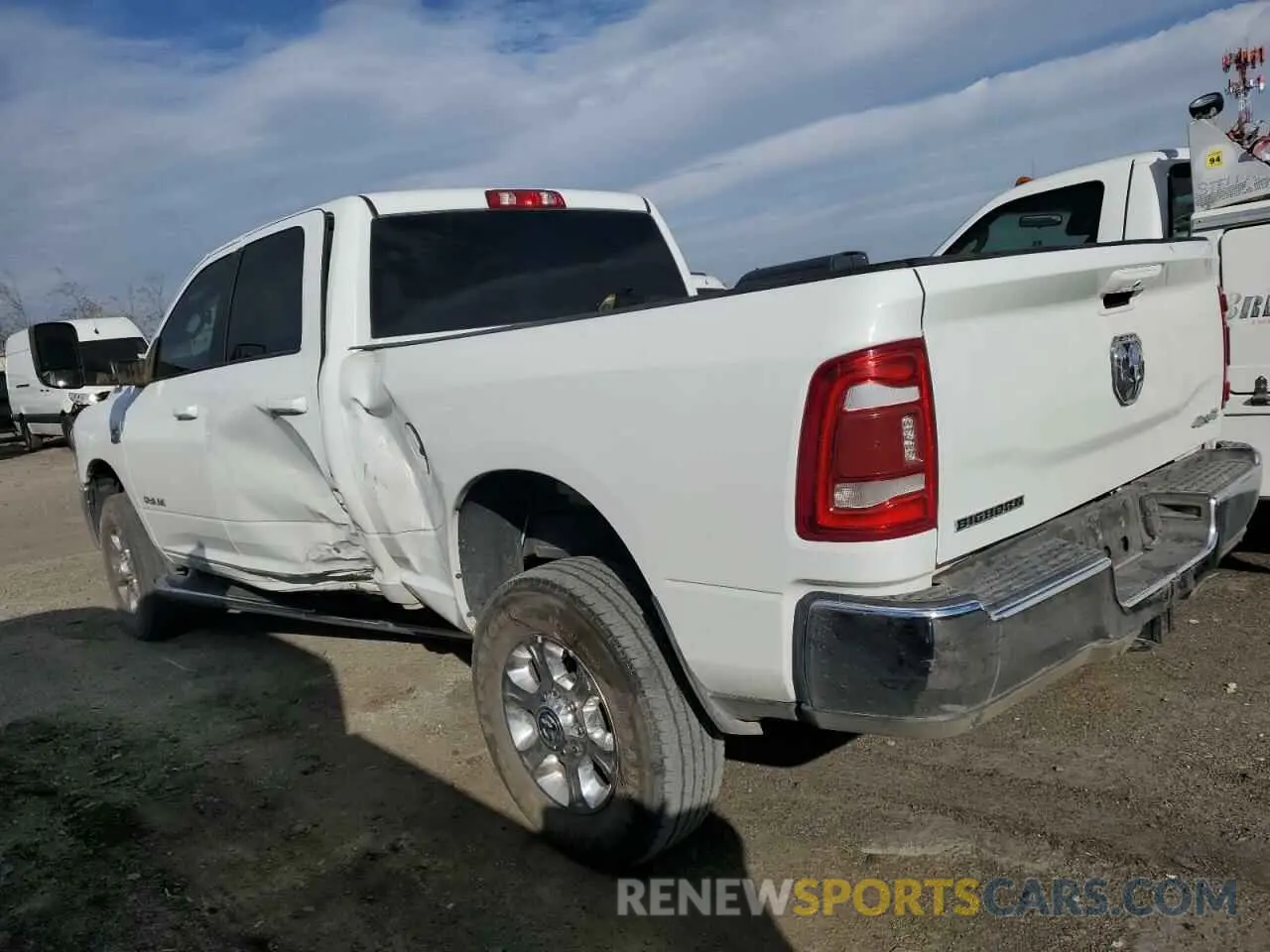 2 Photograph of a damaged car 3C6UR5DL4NG271534 RAM 2500 2022