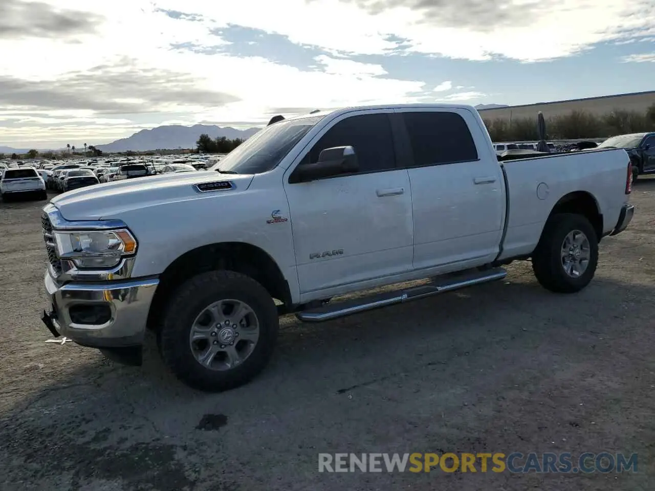1 Photograph of a damaged car 3C6UR5DL4NG297874 RAM 2500 2022