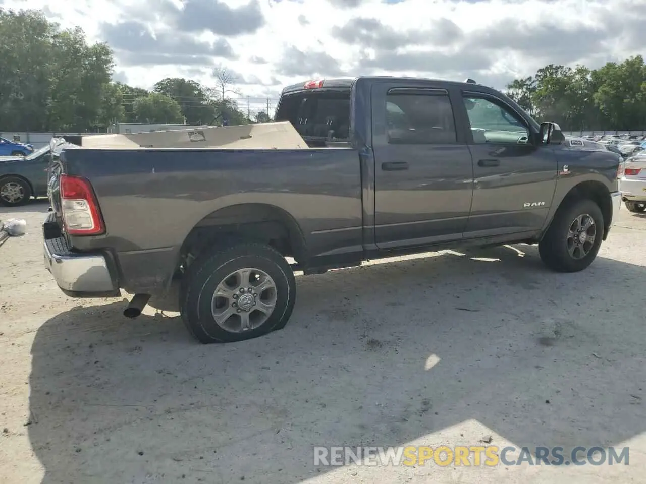3 Photograph of a damaged car 3C6UR5DL4NG380267 RAM 2500 2022