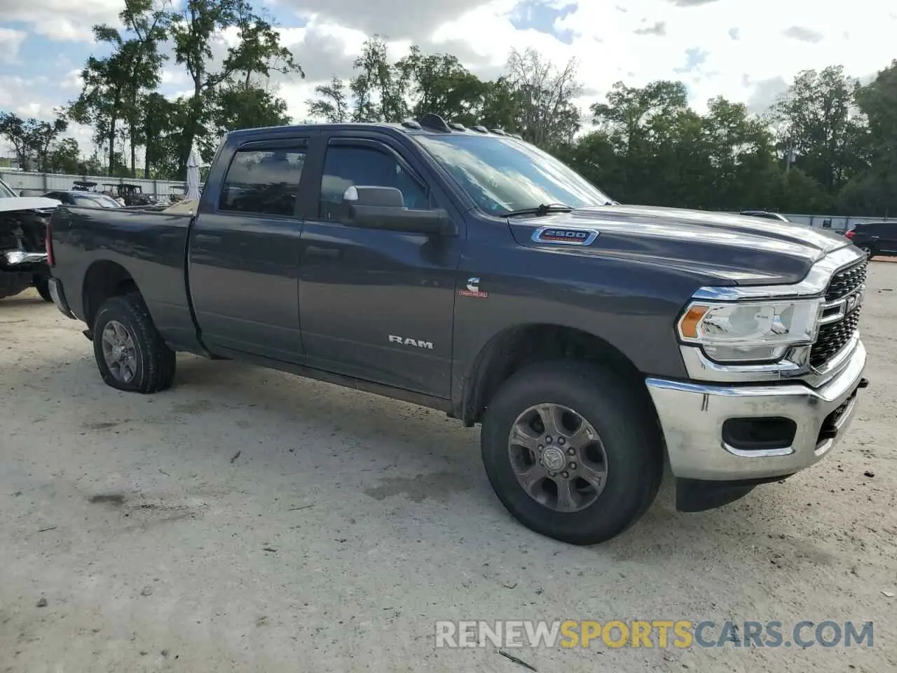 4 Photograph of a damaged car 3C6UR5DL4NG380267 RAM 2500 2022
