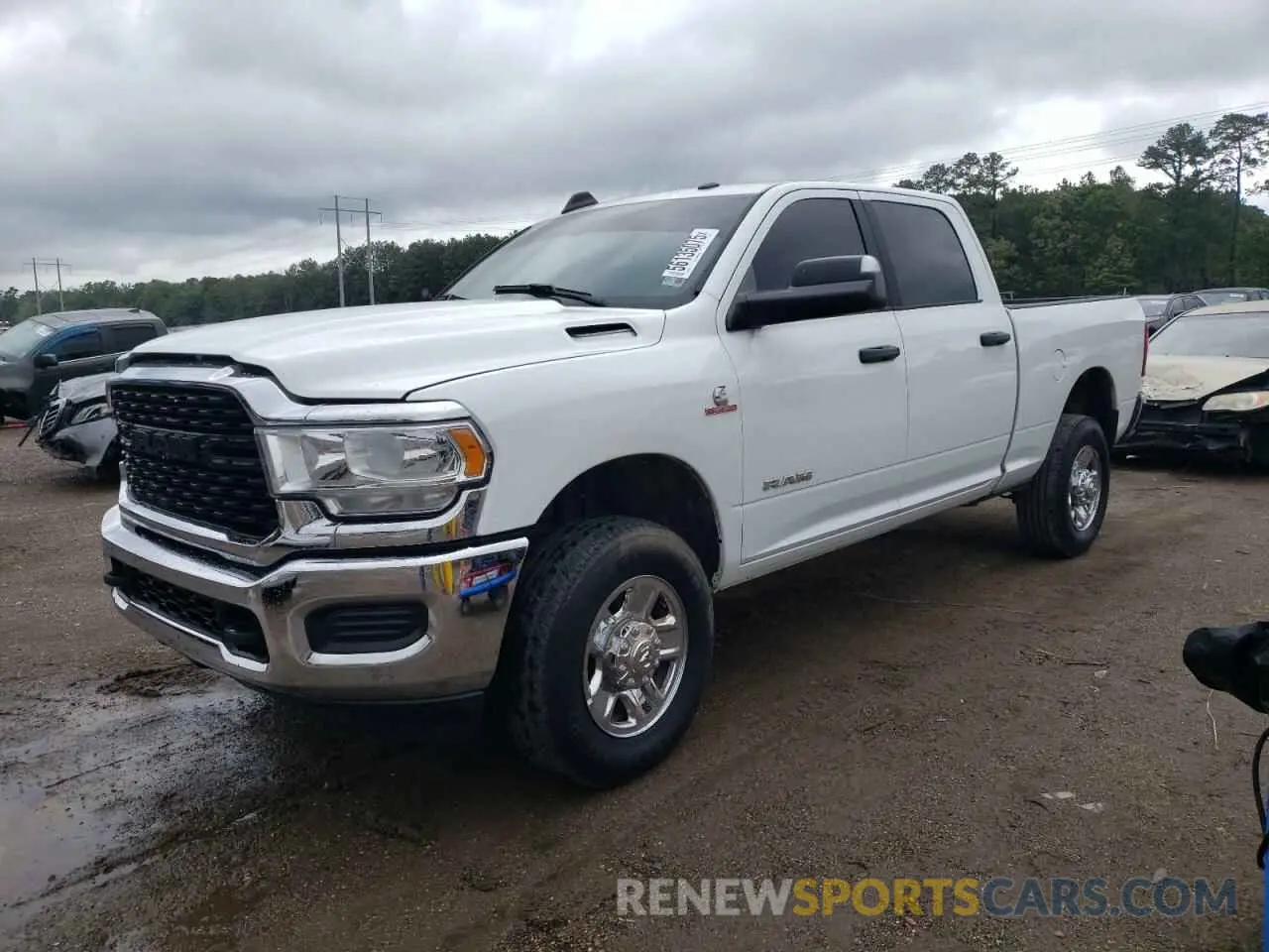 1 Photograph of a damaged car 3C6UR5DL4NG422033 RAM 2500 2022