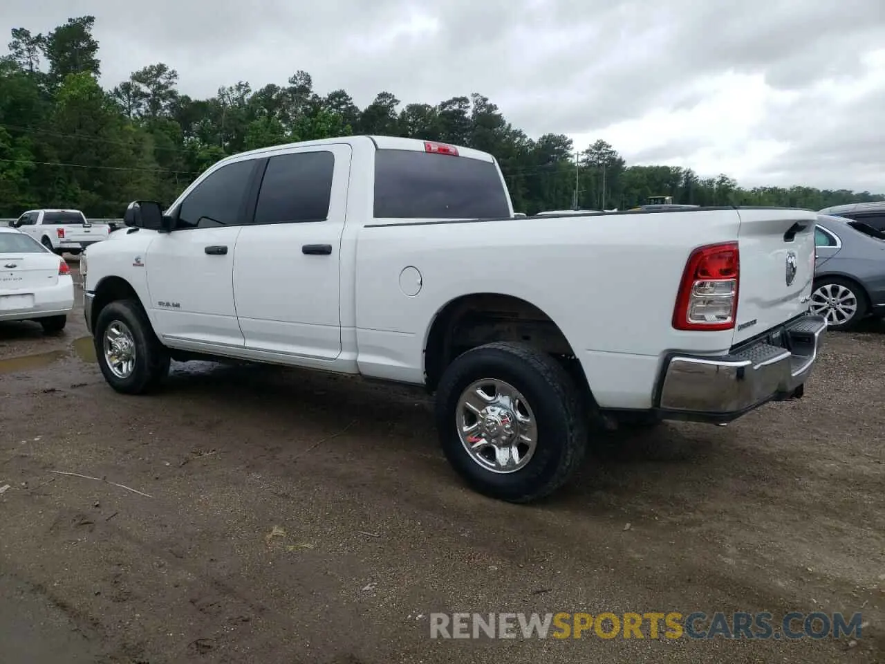 2 Photograph of a damaged car 3C6UR5DL4NG422033 RAM 2500 2022