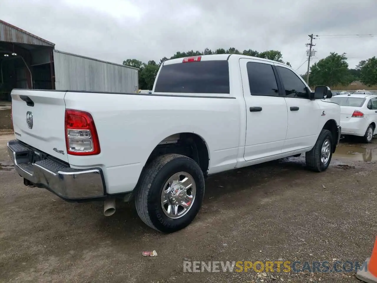 3 Photograph of a damaged car 3C6UR5DL4NG422033 RAM 2500 2022